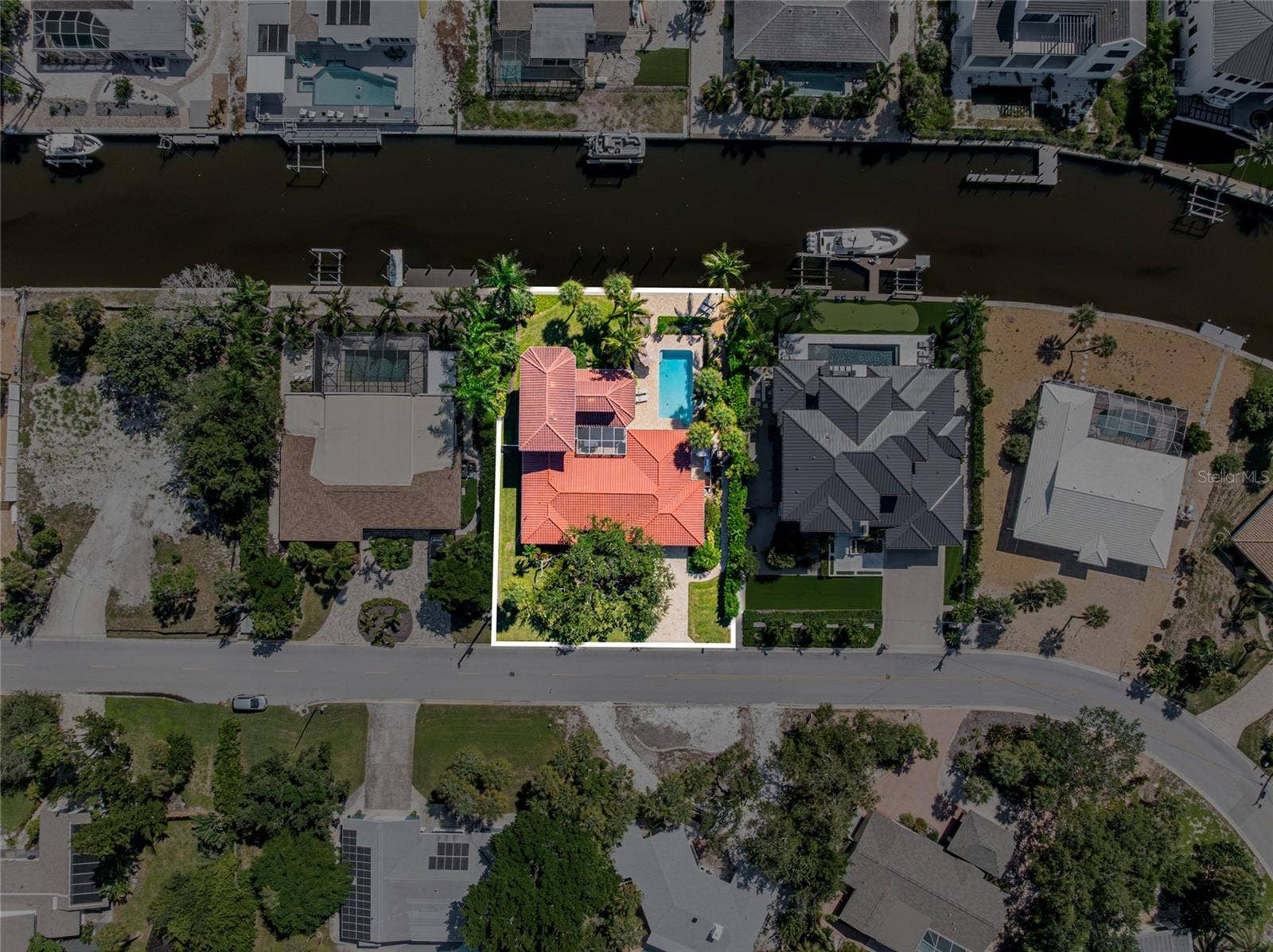 Top Down Neighborhood Aerial, providing a broader perspective of the property and its Siesta Key setting.