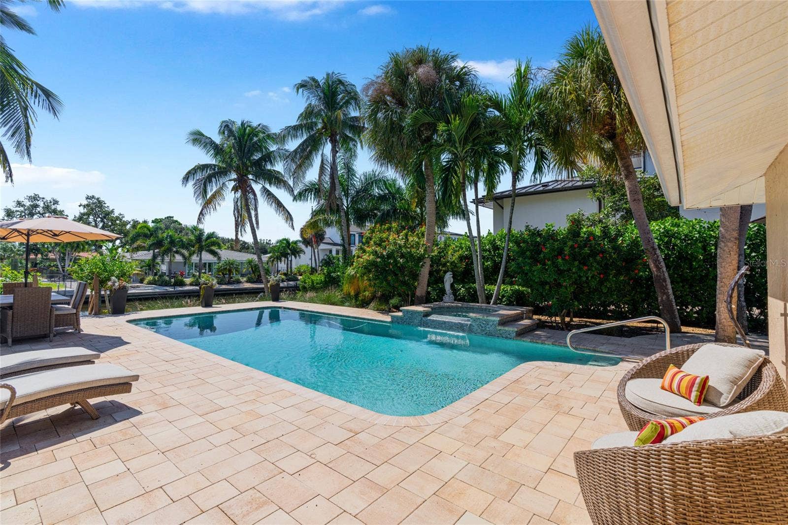Pool Patio Daytime, creating an inviting setting for relaxing and entertaining.