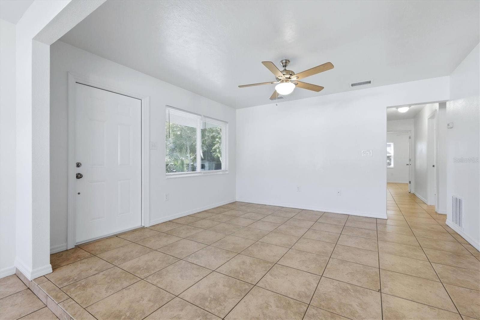 1240 HIGHLAND STREET, Sarasota, FL 34234 Entry door into the Living room.
