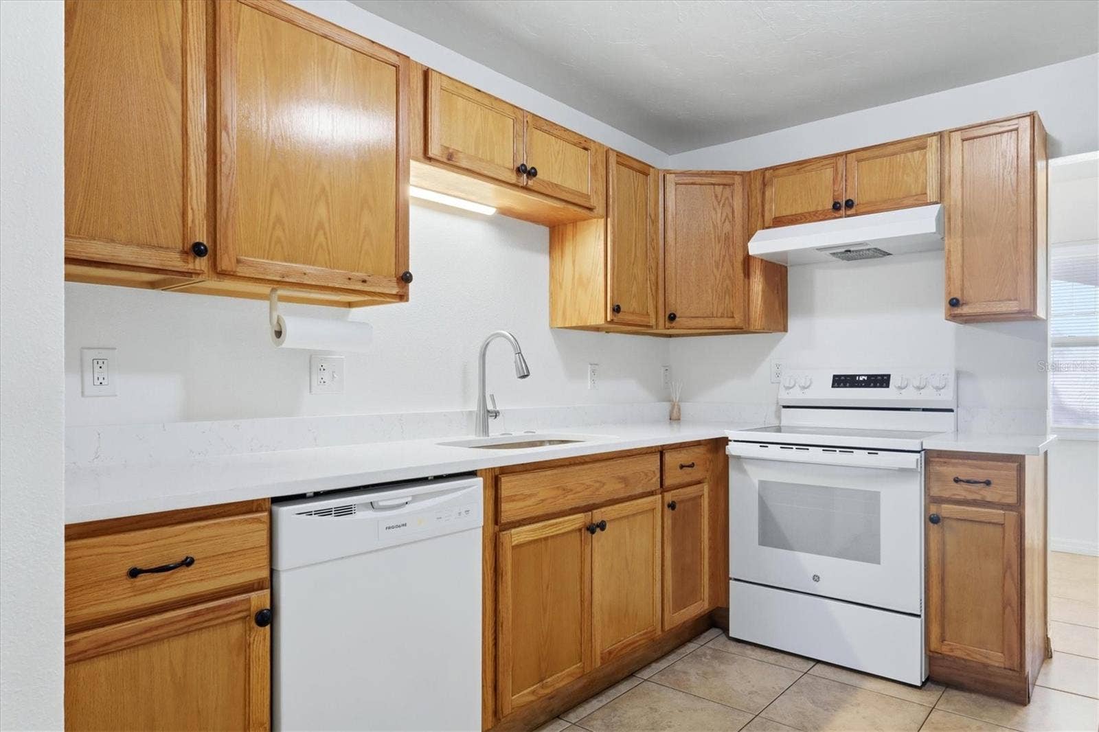 1240 HIGHLAND STREET, Sarasota, FL 34234 Wood cabinets.
