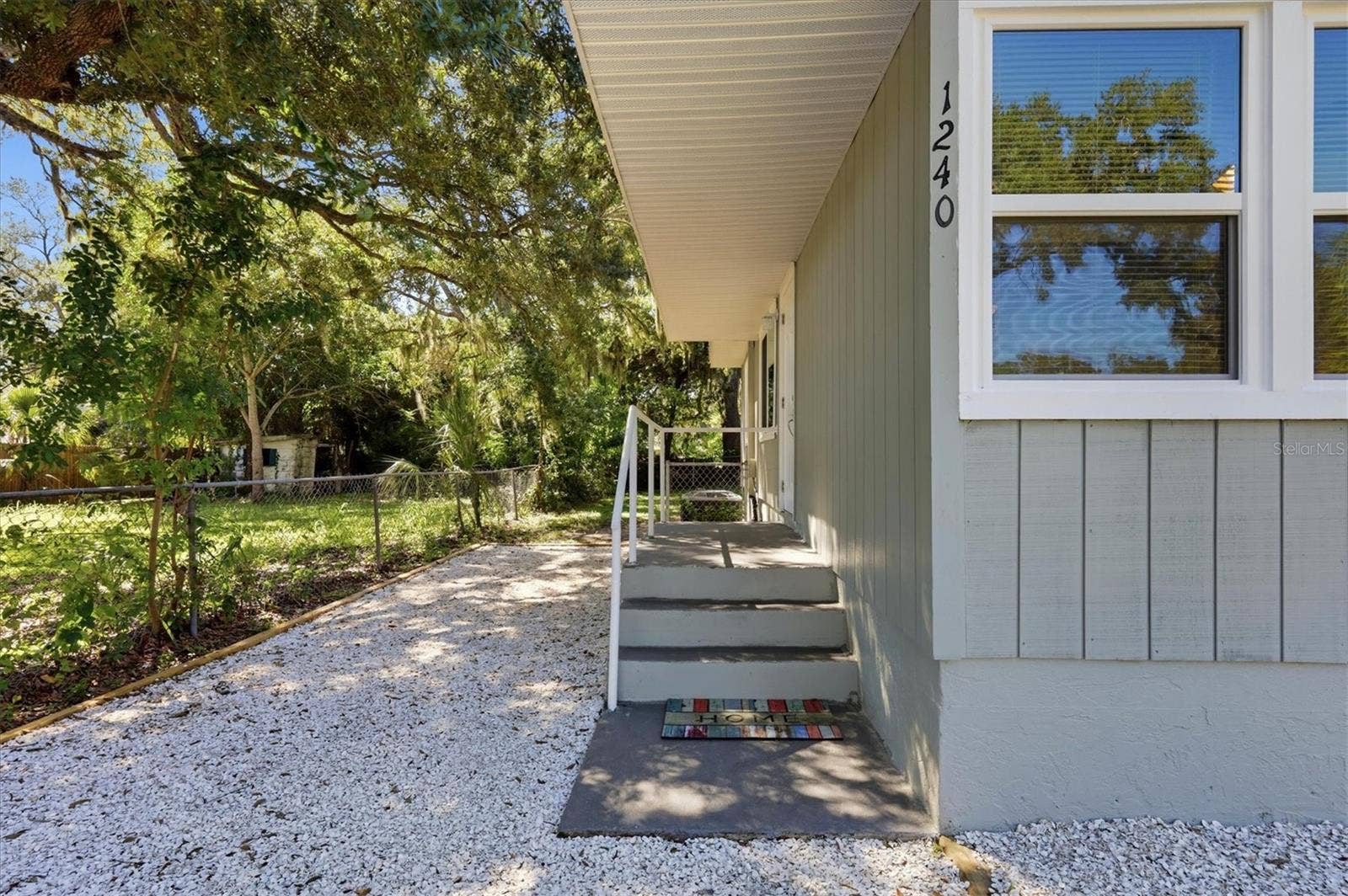 1240 HIGHLAND STREET, Sarasota, FL 34234 Entry steps to the front door.