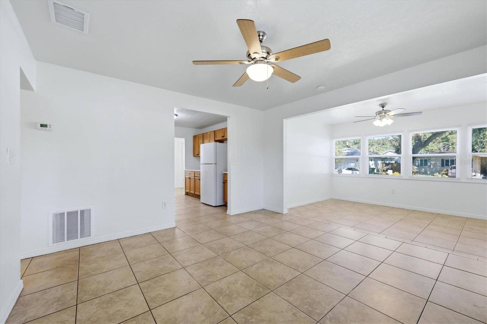 1240 HIGHLAND STREET, Sarasota, FL 34234 Step down to the Dining room from the Living room.