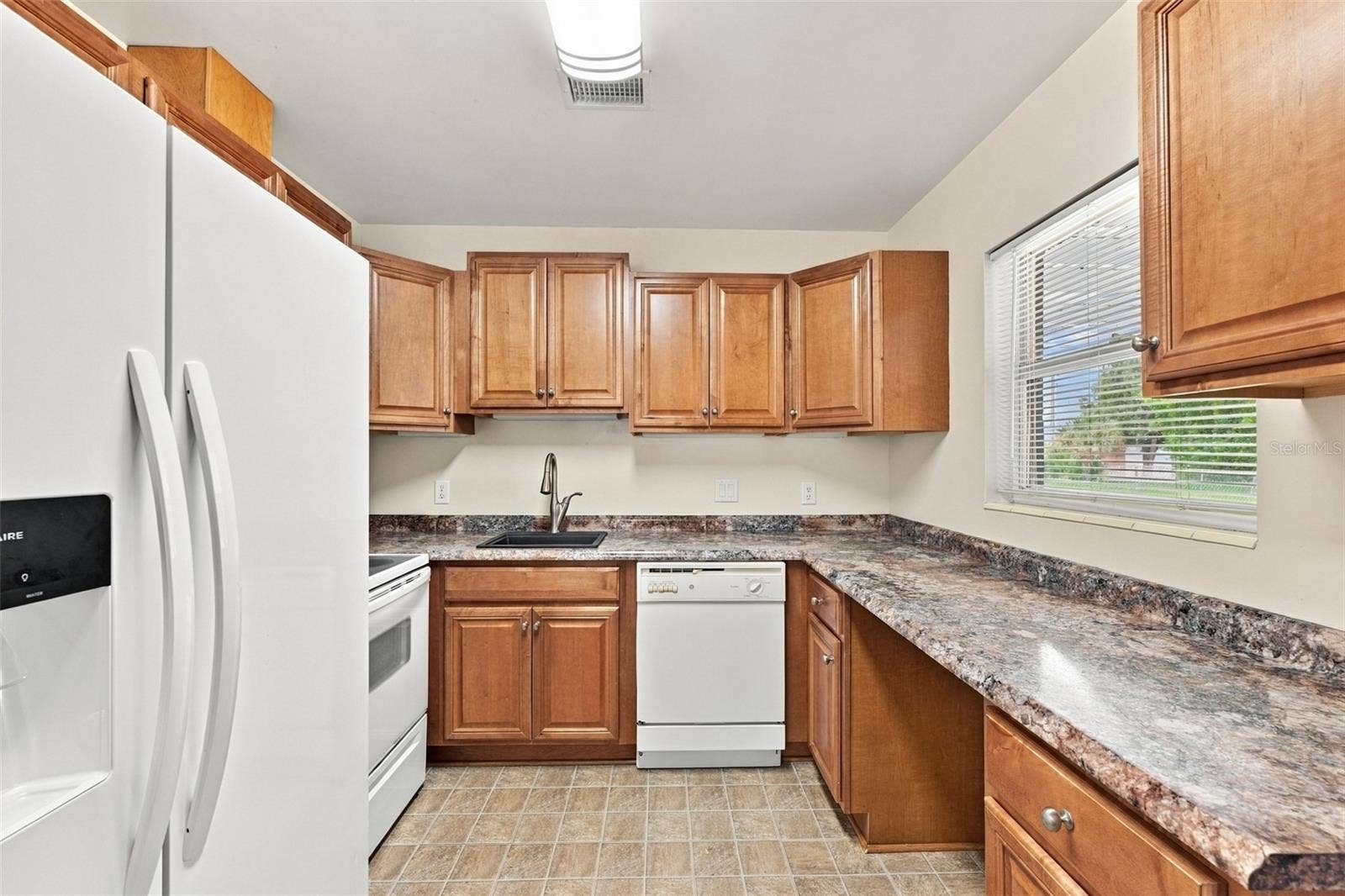 1007 21ST AVENUE W, Palmetto, FL 34221 Kitchen (Window looks out over backyard.)