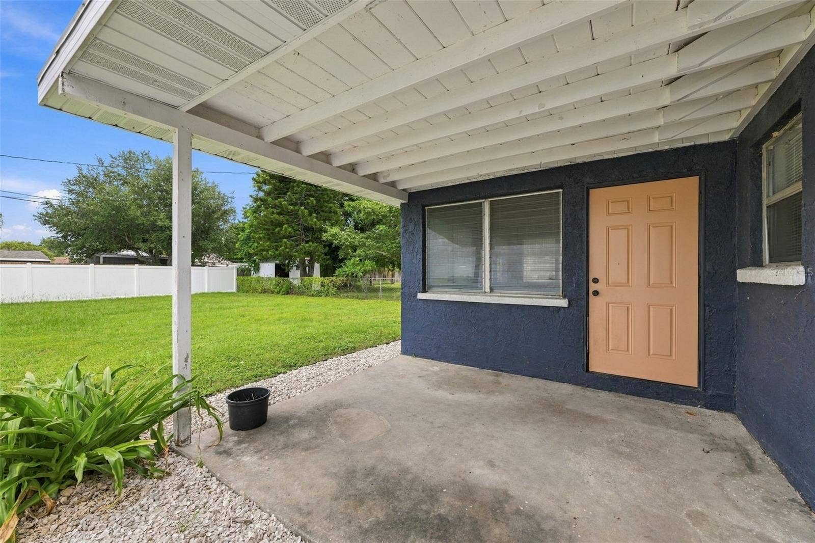 1007 21ST AVENUE W, Palmetto, FL 34221 Covered Patio Area