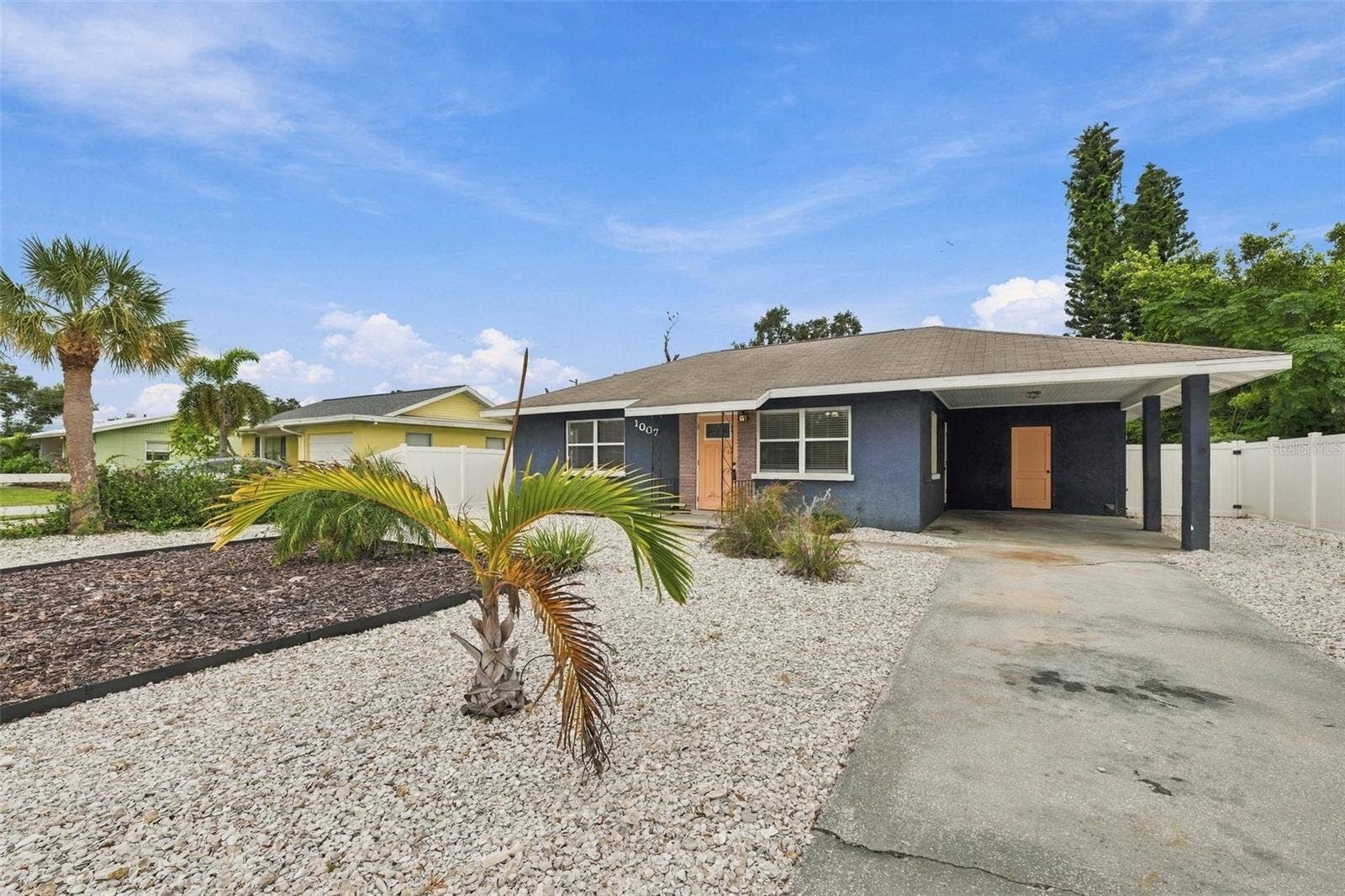 1007 21ST AVENUE W, Palmetto, FL 34221 Driveway to Carport