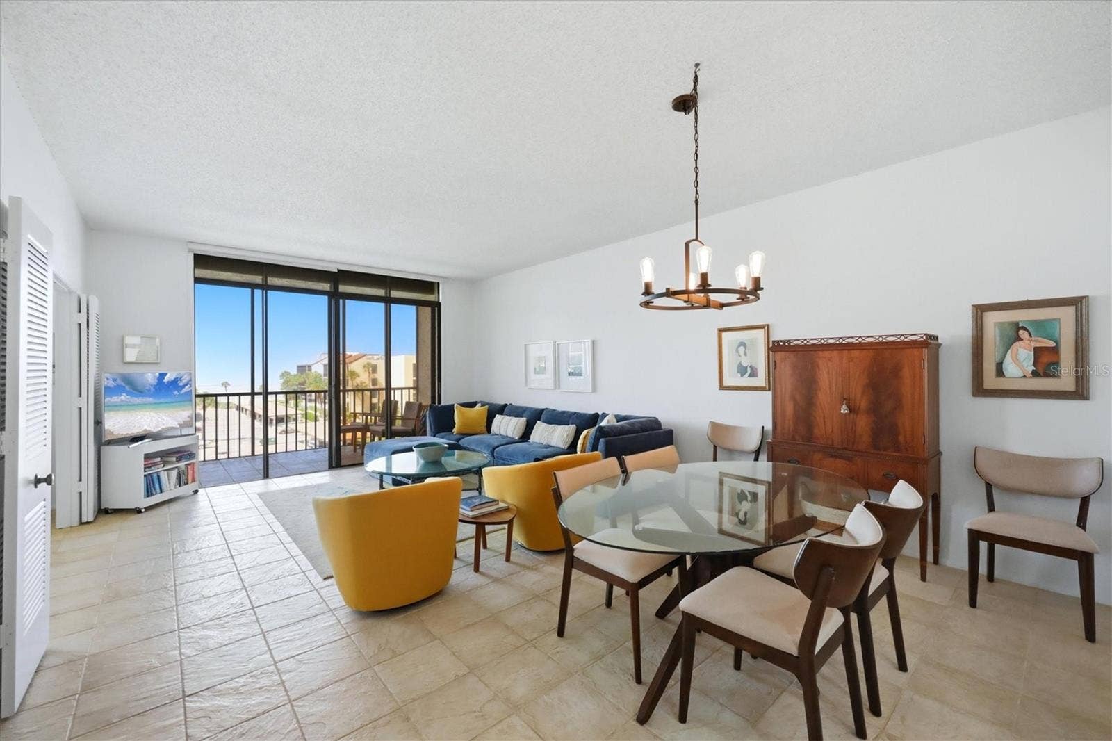 1955 GULF OF MEXICO DRIVE, #G6-407, Longboat Key, FL 34228 Living room and dining room