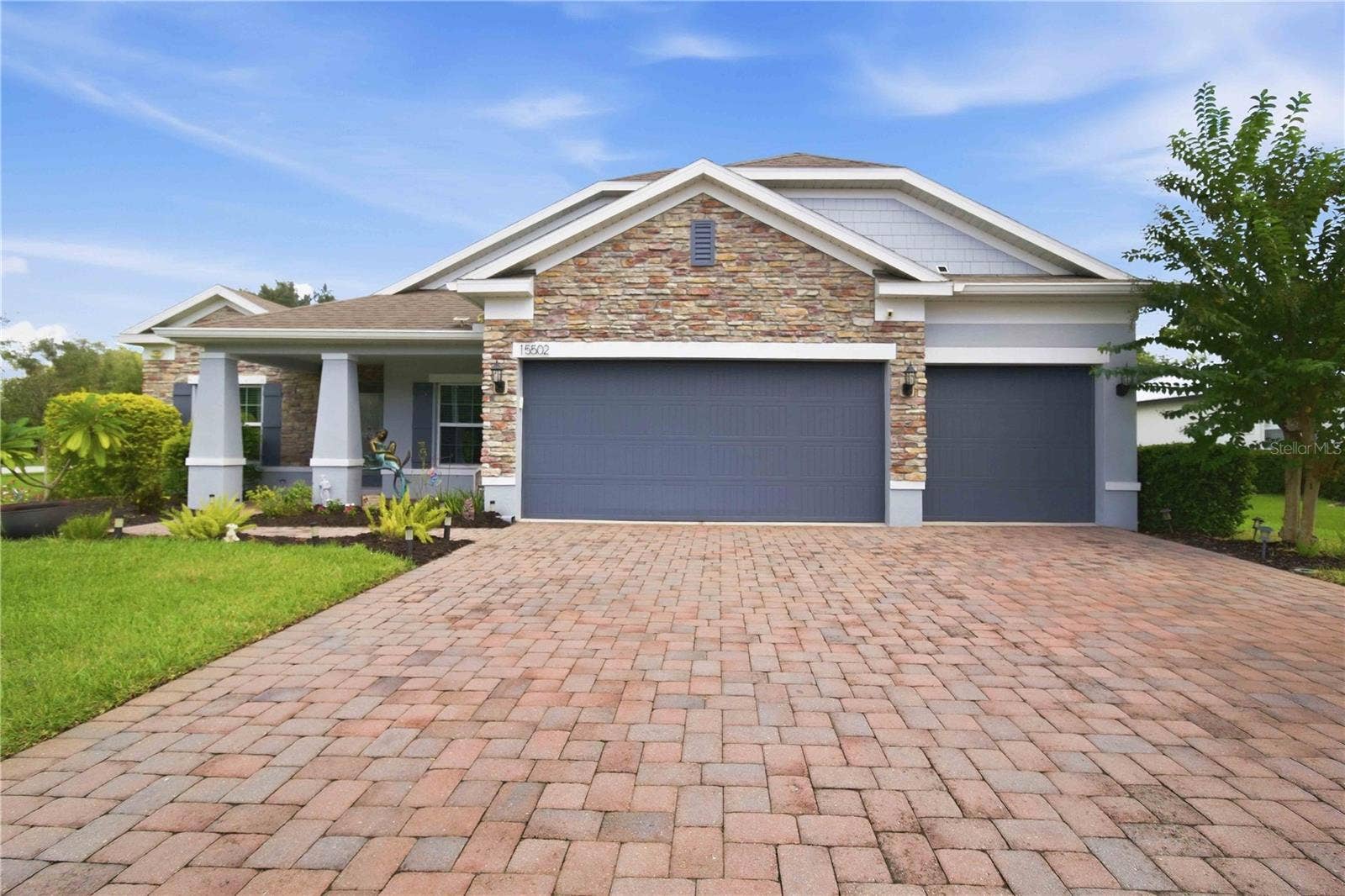 15502 31ST STREET E, Parrish, FL 34219 Daytime front exterior with inviting curb appeal.