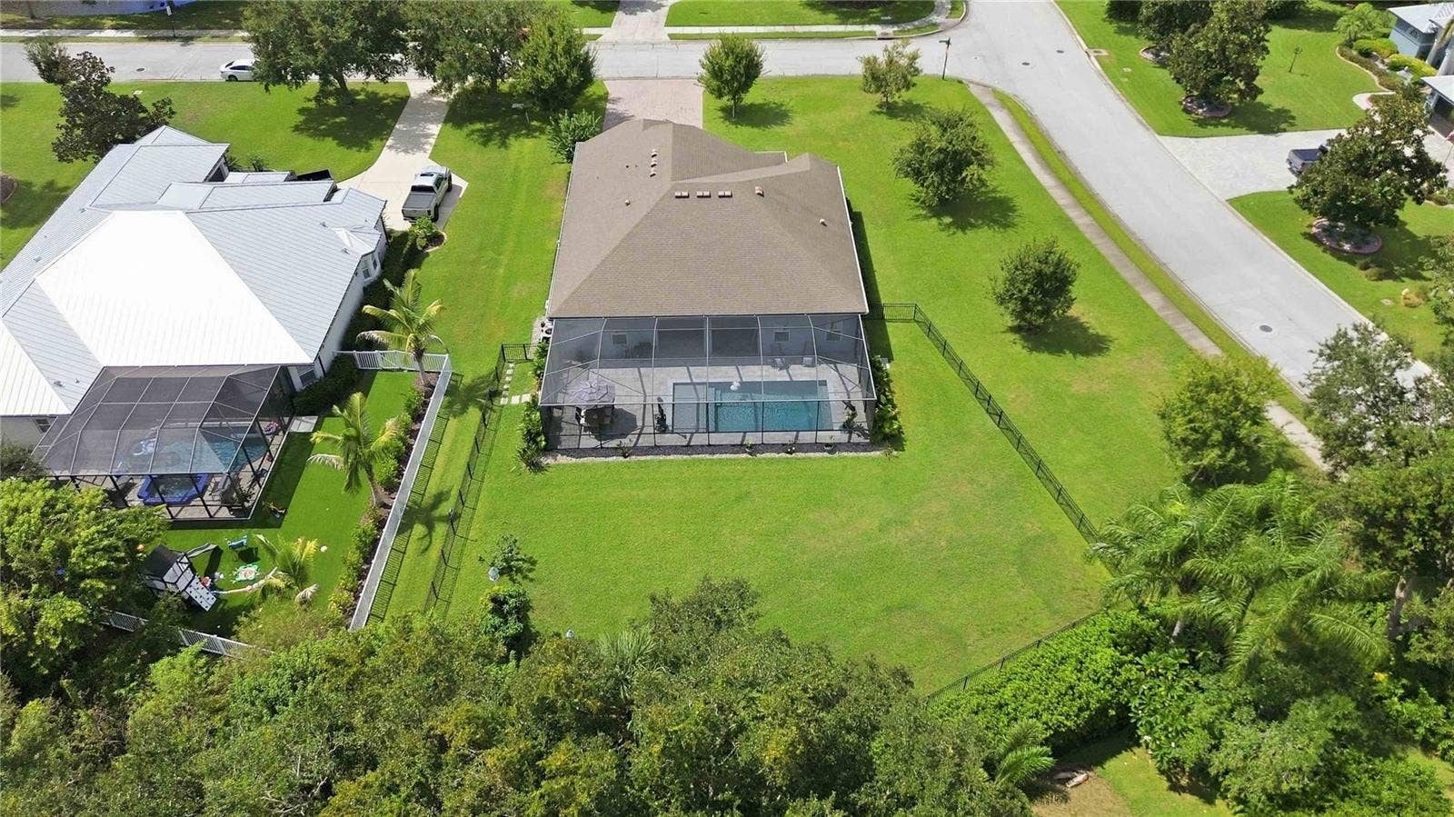 15502 31ST STREET E, Parrish, FL 34219 Elevated view of backyard and pool