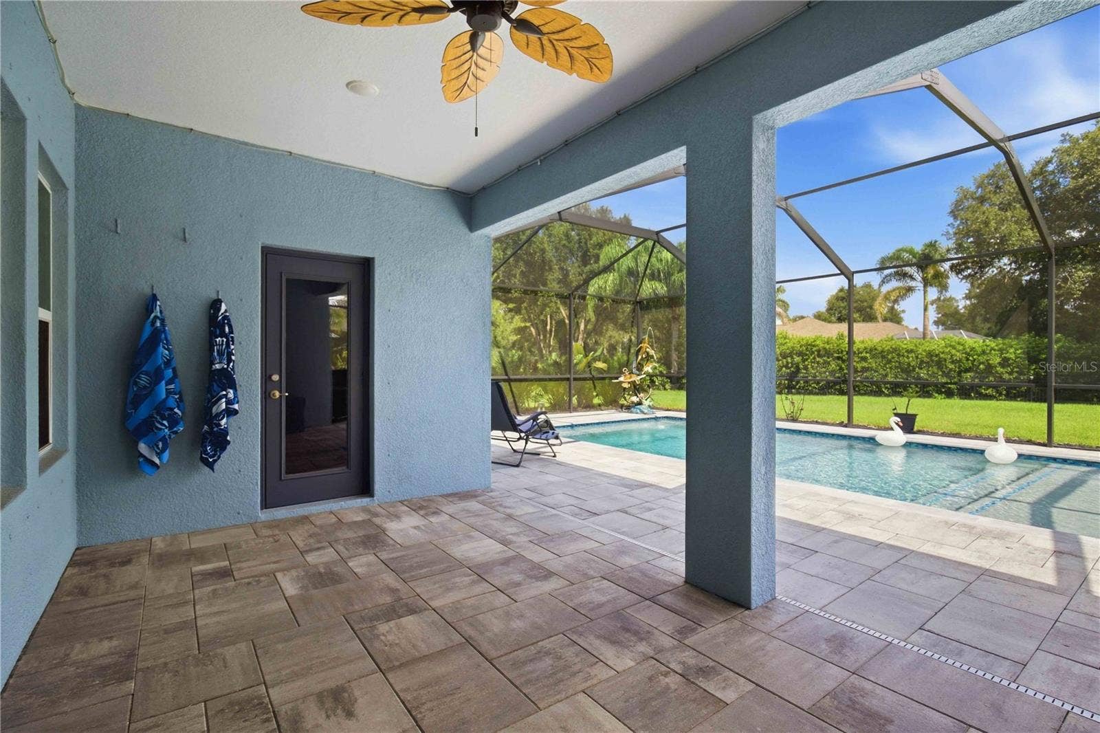 15502 31ST STREET E, Parrish, FL 34219 Covered lanai overlooking the pool
