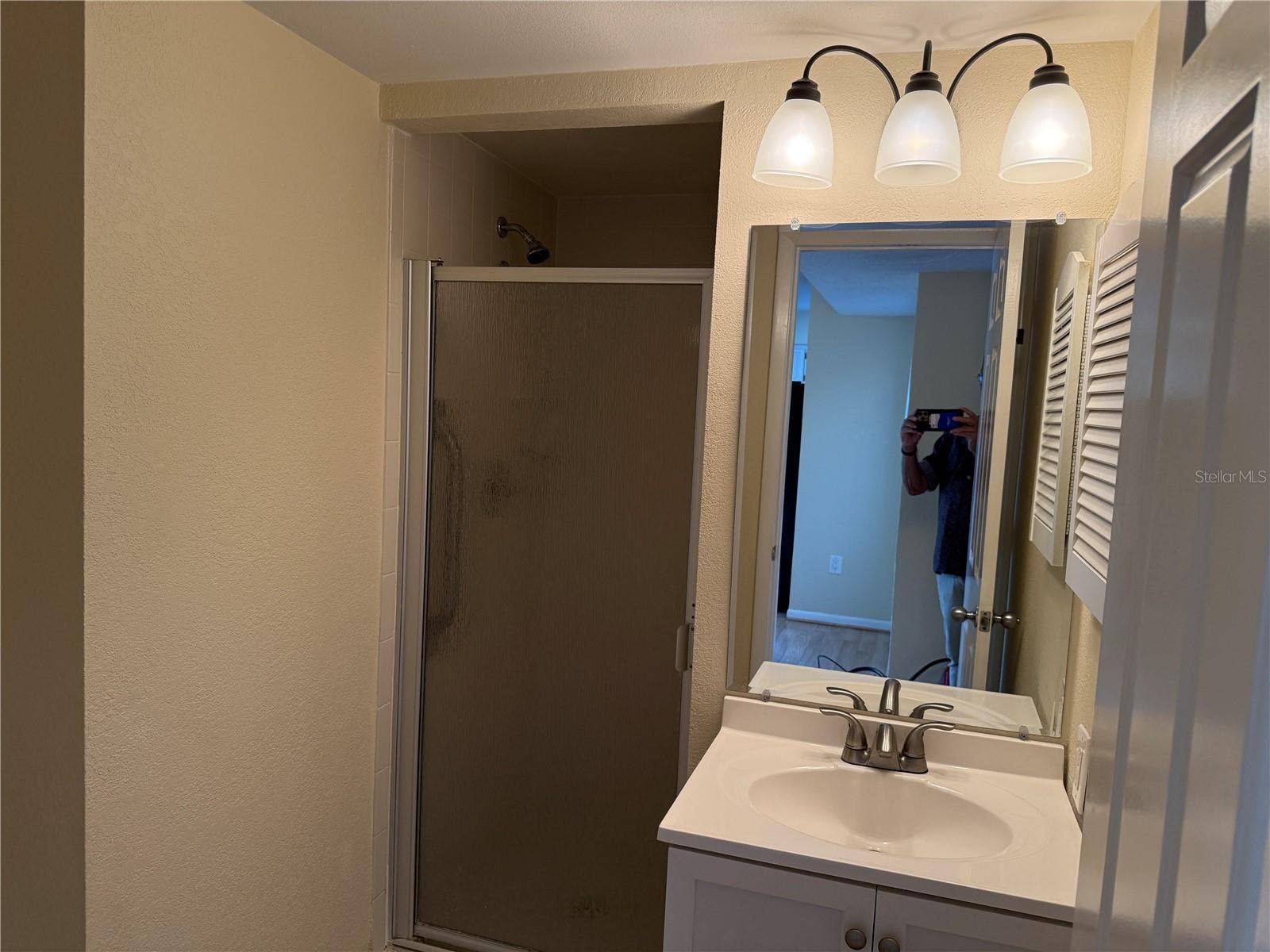 5697 ASHTON LAKE DRIVE, #6, Sarasota, FL 34231 guest bathroom