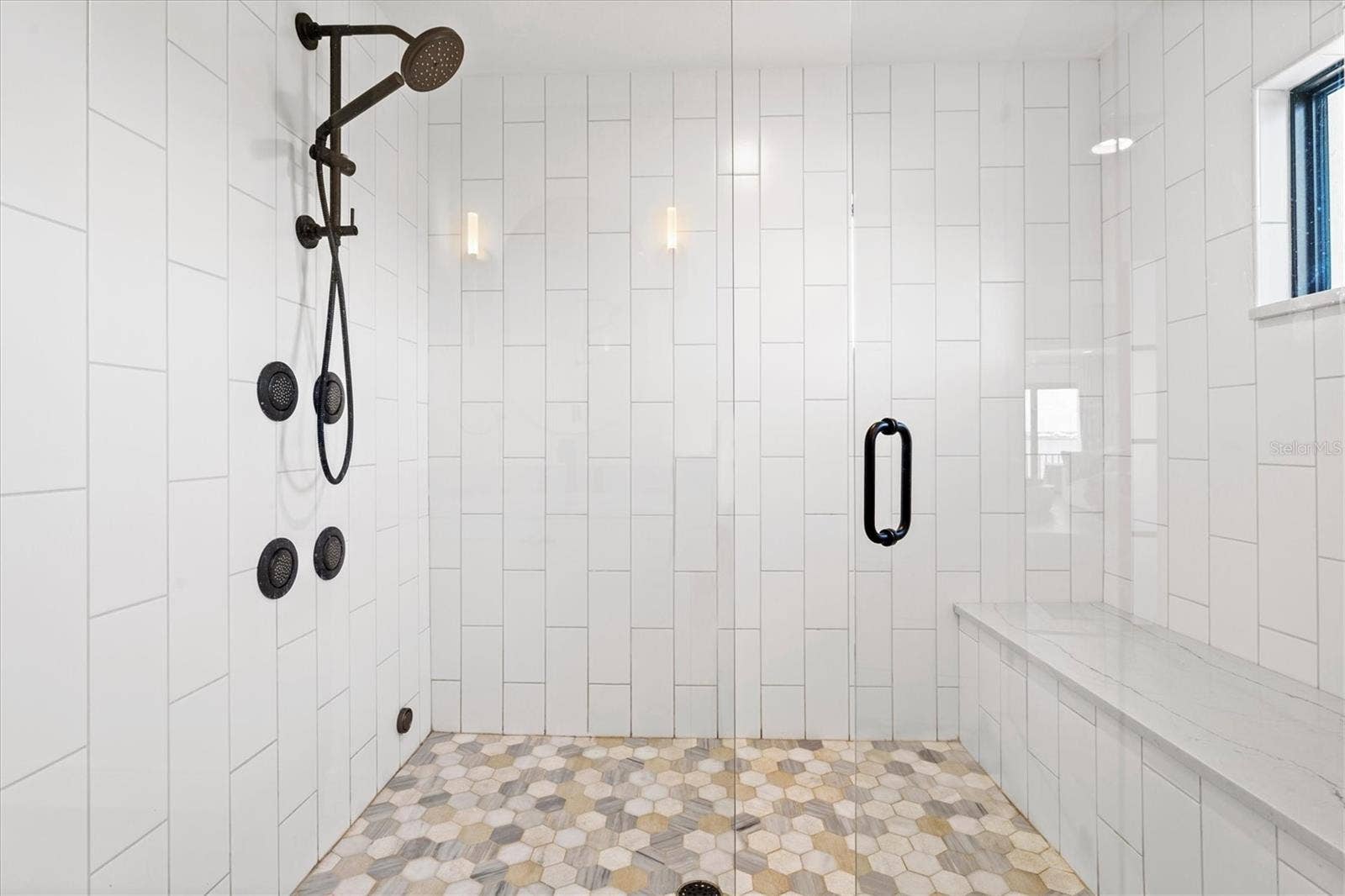 1914 RIVERSIDE DRIVE E, Bradenton, FL 34208 Primary suite bath with steam shower.