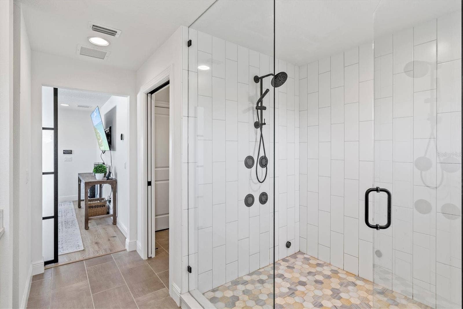 1914 RIVERSIDE DRIVE E, Bradenton, FL 34208 Primary suite bath with steam shower.