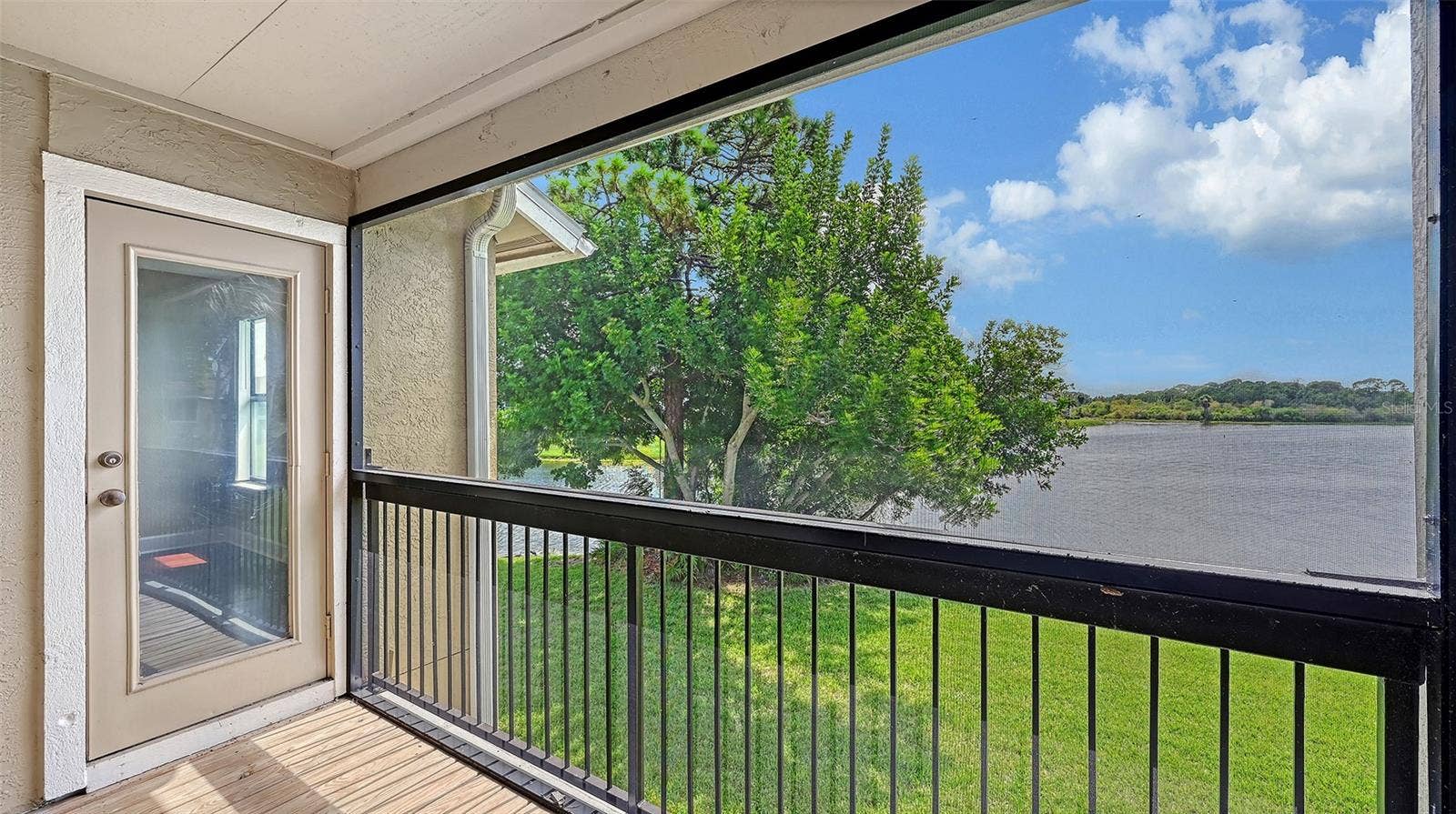 4025 CROCKERS LAKE BOULEVARD, #22, Sarasota, FL 34238 Access to Balcony from Main Bedroom