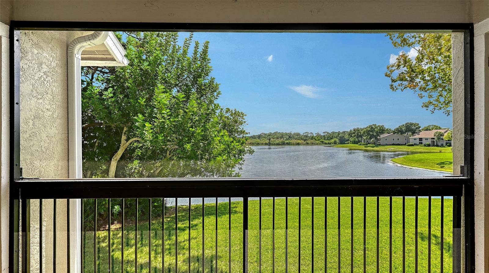 4025 CROCKERS LAKE BOULEVARD, #22, Sarasota, FL 34238 Lake View from the Balcony