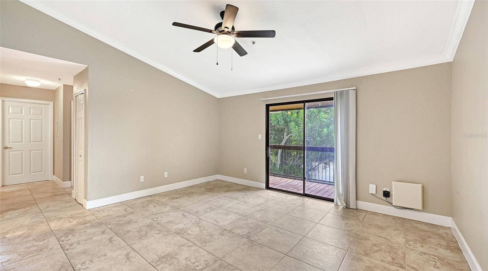 4025 CROCKERS LAKE BOULEVARD, #22, Sarasota, FL 34238 Living Room With Direct access to the Balcony