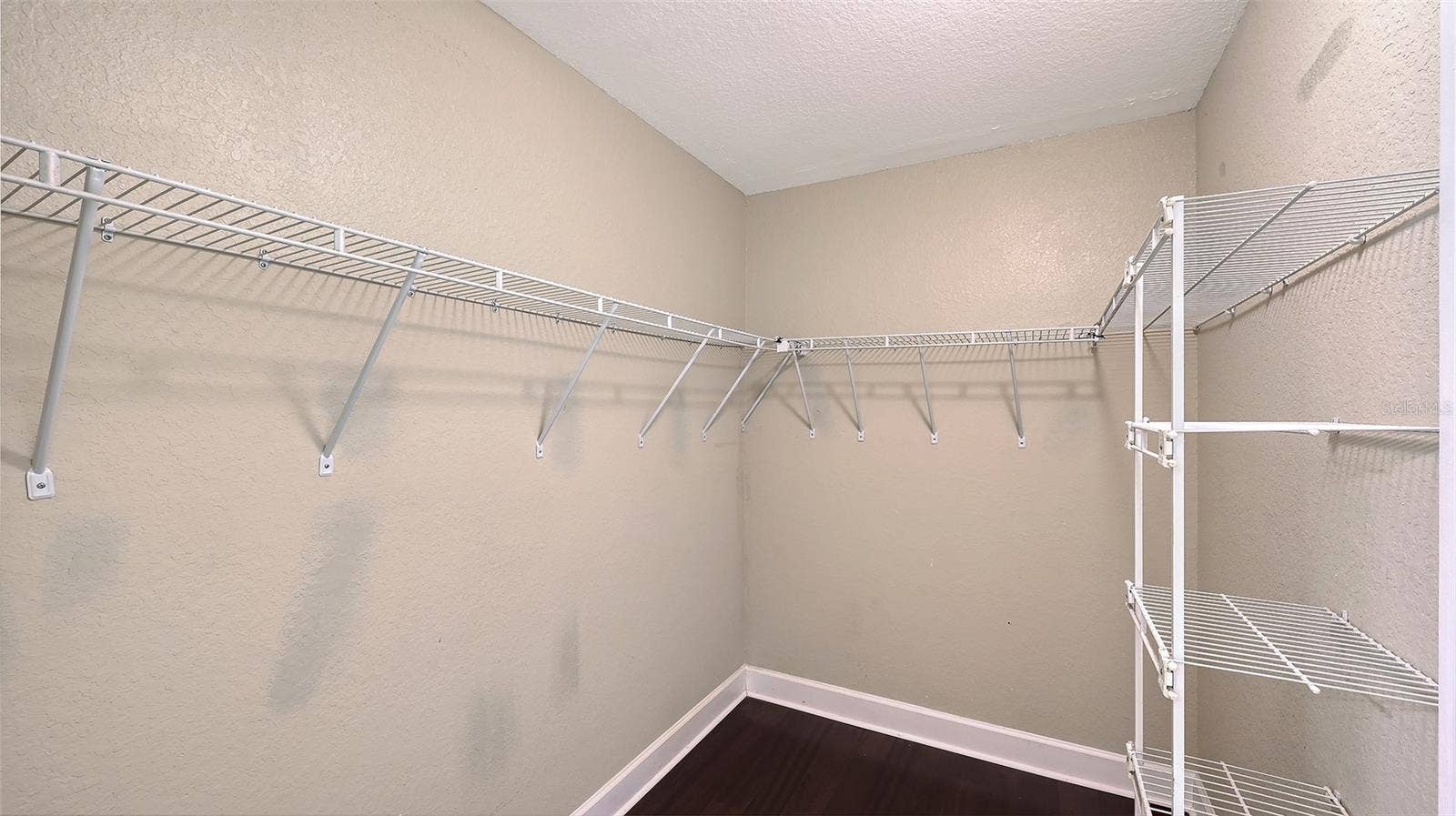 4025 CROCKERS LAKE BOULEVARD, #22, Sarasota, FL 34238 Main Bedroom Walking Closet