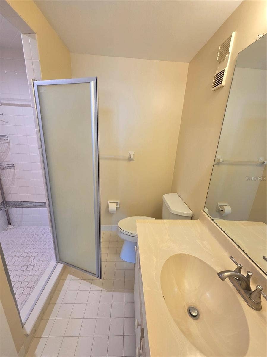 7100 SUNSHINE SKYWAY LANE S, #301, St Petersburg, FL 33711 Owners bedroom ensuite