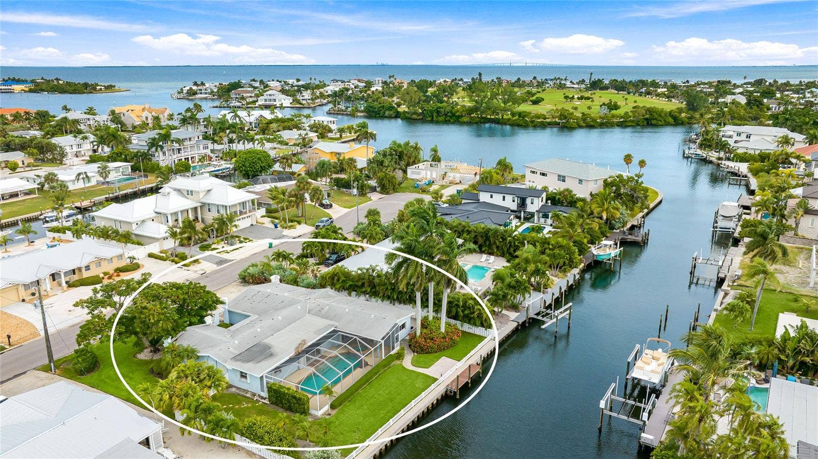 517 71ST STREET, Holmes Beach, FL 34217 The Key Royale private golf course in the background
