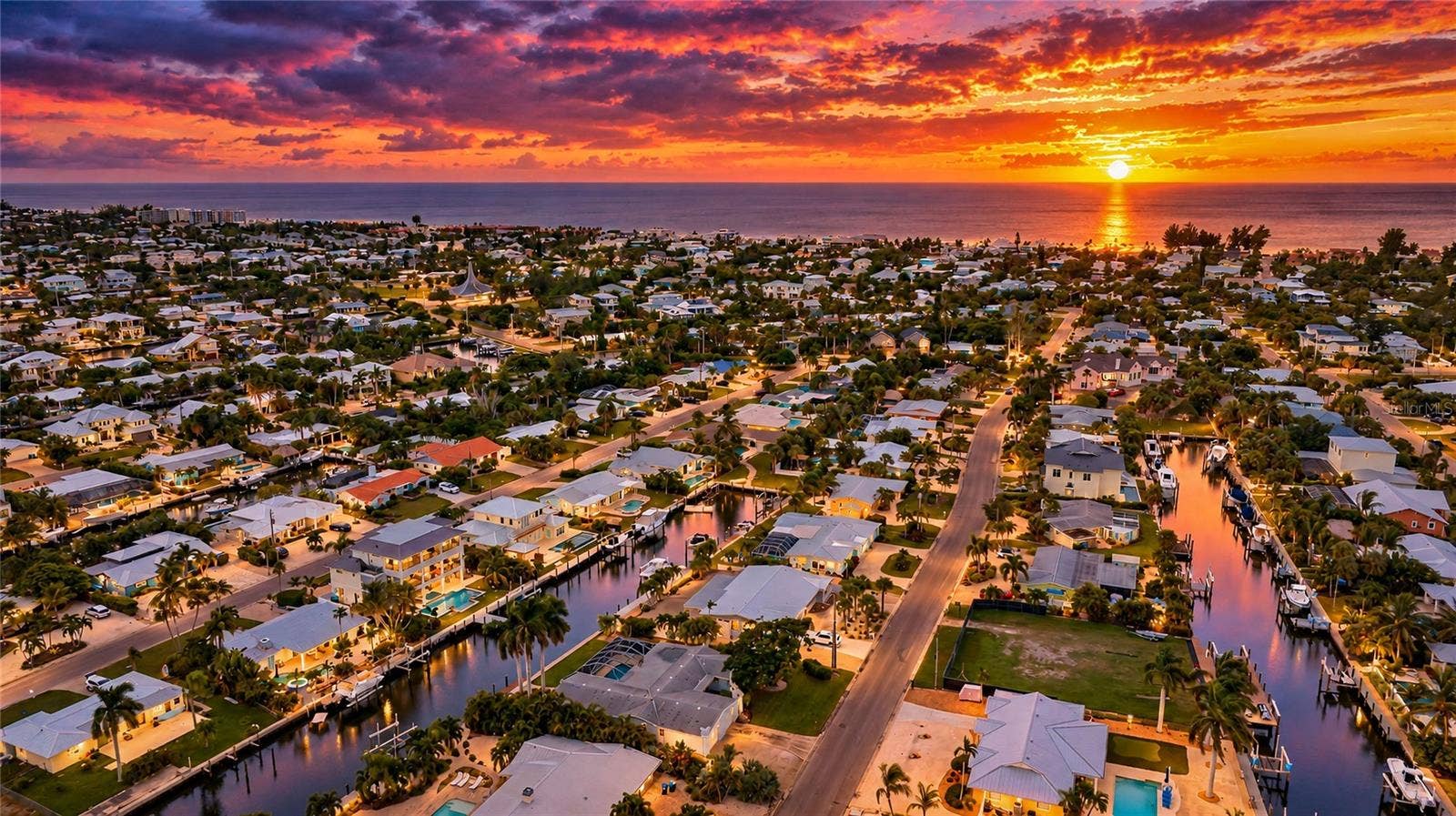 517 71ST STREET, Holmes Beach, FL 34217 Just a short distance to catch a spectacular sunset at the beach