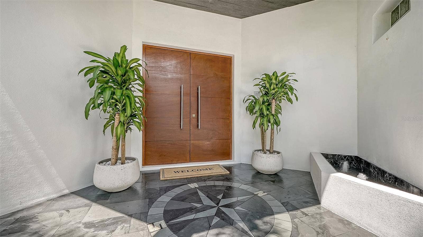 3718 SANDSPUR LANE, Nokomis, FL 34275 A marble compass entry leads the way