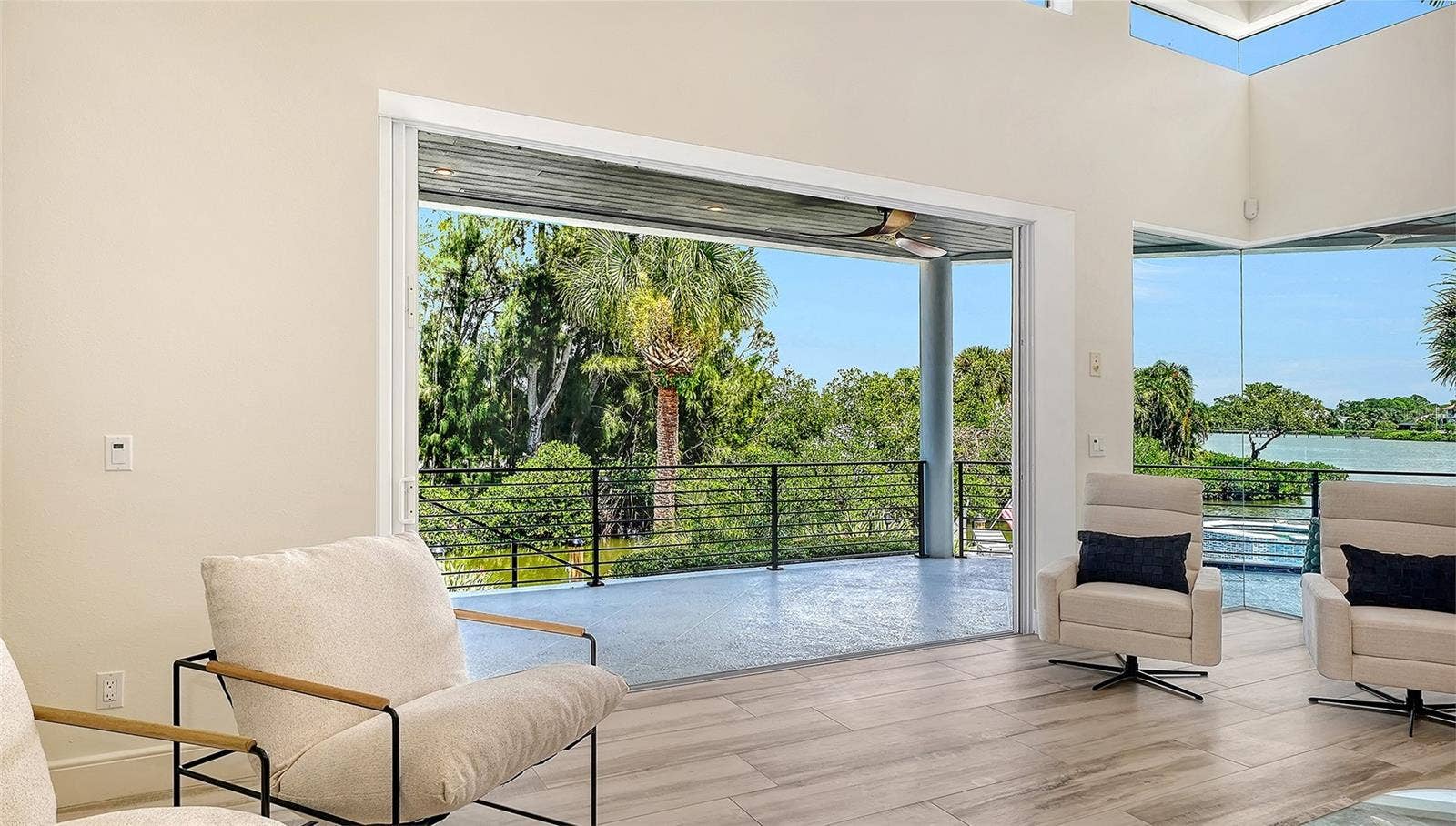 3718 SANDSPUR LANE, Nokomis, FL 34275 Vanishing slider doors to the waterfront