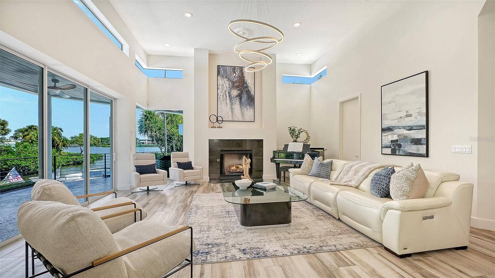 3718 SANDSPUR LANE, Nokomis, FL 34275 From the moment you walk through the doors, you'll be drawn to the view