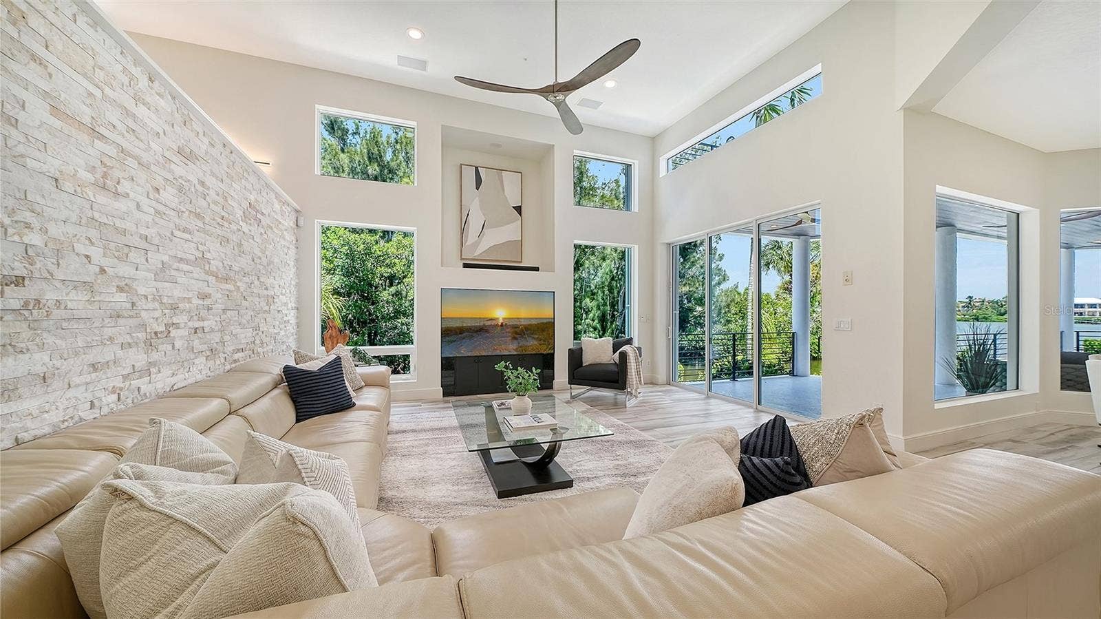 3718 SANDSPUR LANE, Nokomis, FL 34275 Family room embraces the open floor plan