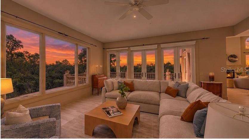 168 COASTAL HAMMOCK COURT, Osprey, FL 34229 The family room becomes a front row seat to Sarasota's spectacular evening skies.