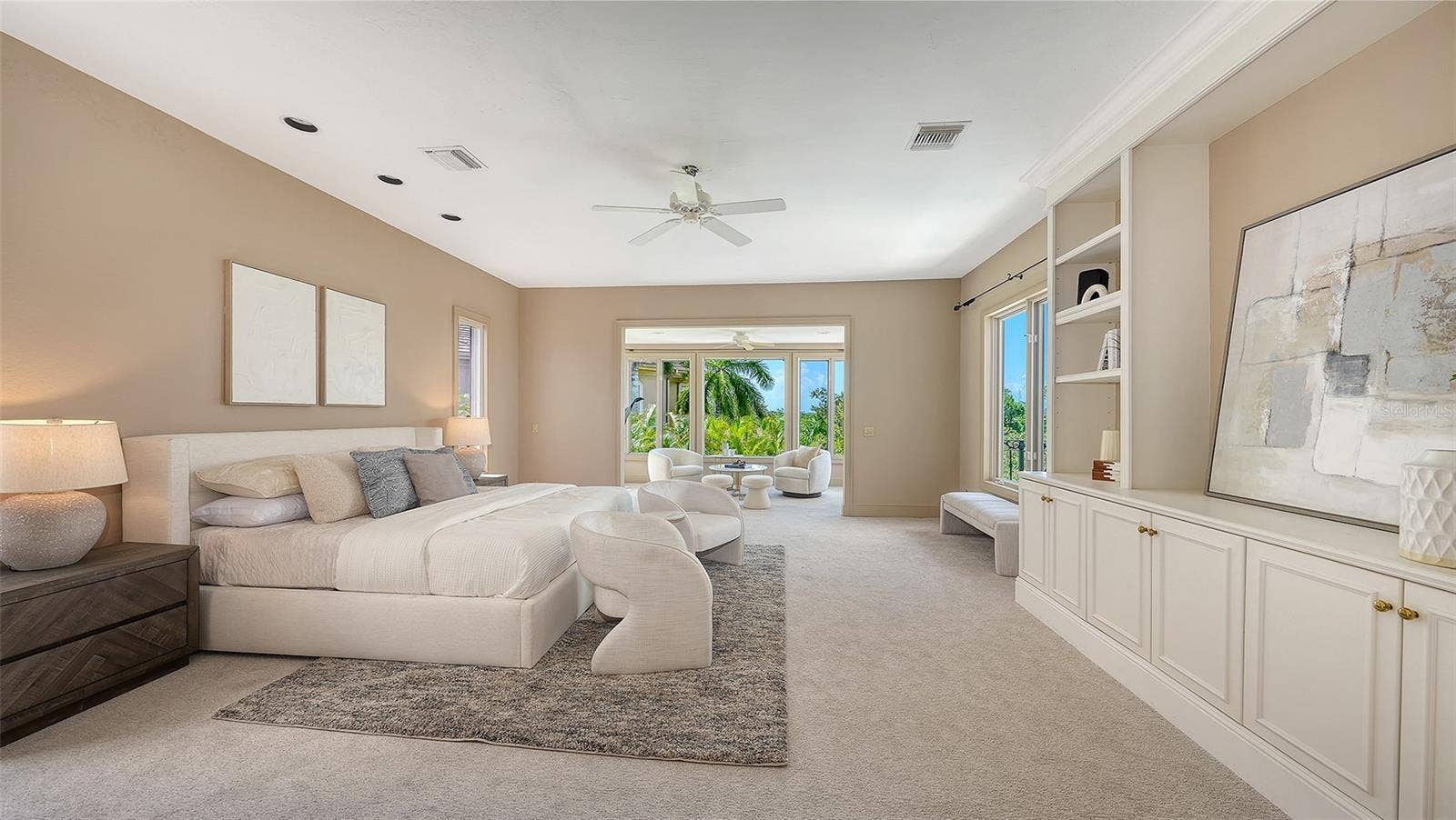 168 COASTAL HAMMOCK COURT, Osprey, FL 34229 The primary suite occupies its own private level with generous proportions, custom built ins and a separate sitting area.