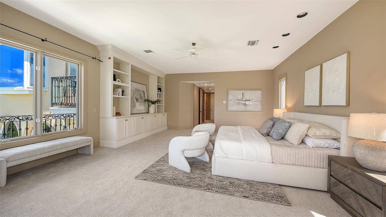 168 COASTAL HAMMOCK COURT, Osprey, FL 34229 Extensive built ins add architectural interest and exceptional functionality to this spacious private retreat.