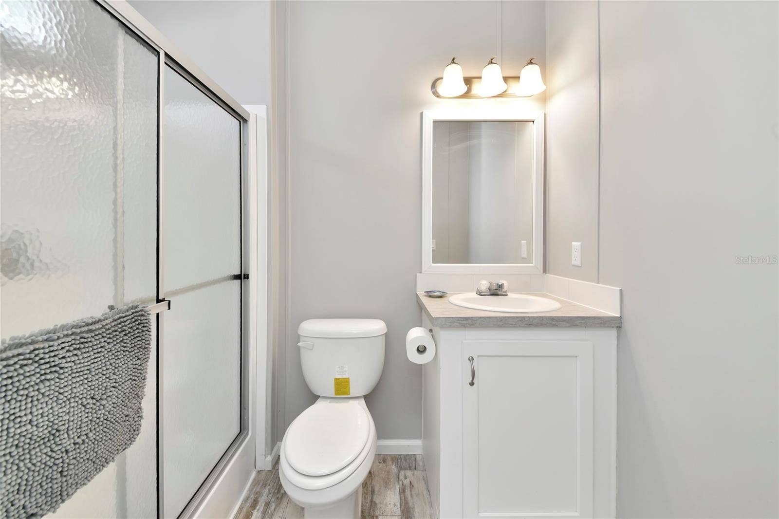 6843 HIKINA DRIVE, North Port, FL 34287 Primary en-suite bathroom with walk-in shower