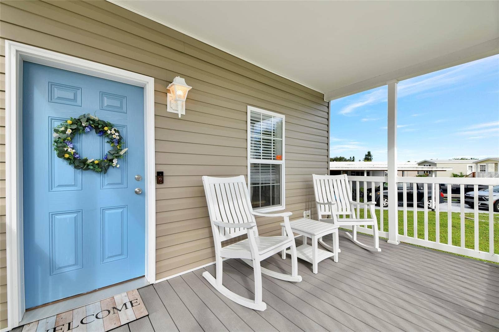 6843 HIKINA DRIVE, North Port, FL 34287 Beautiful covered porch complete with rocking chairs