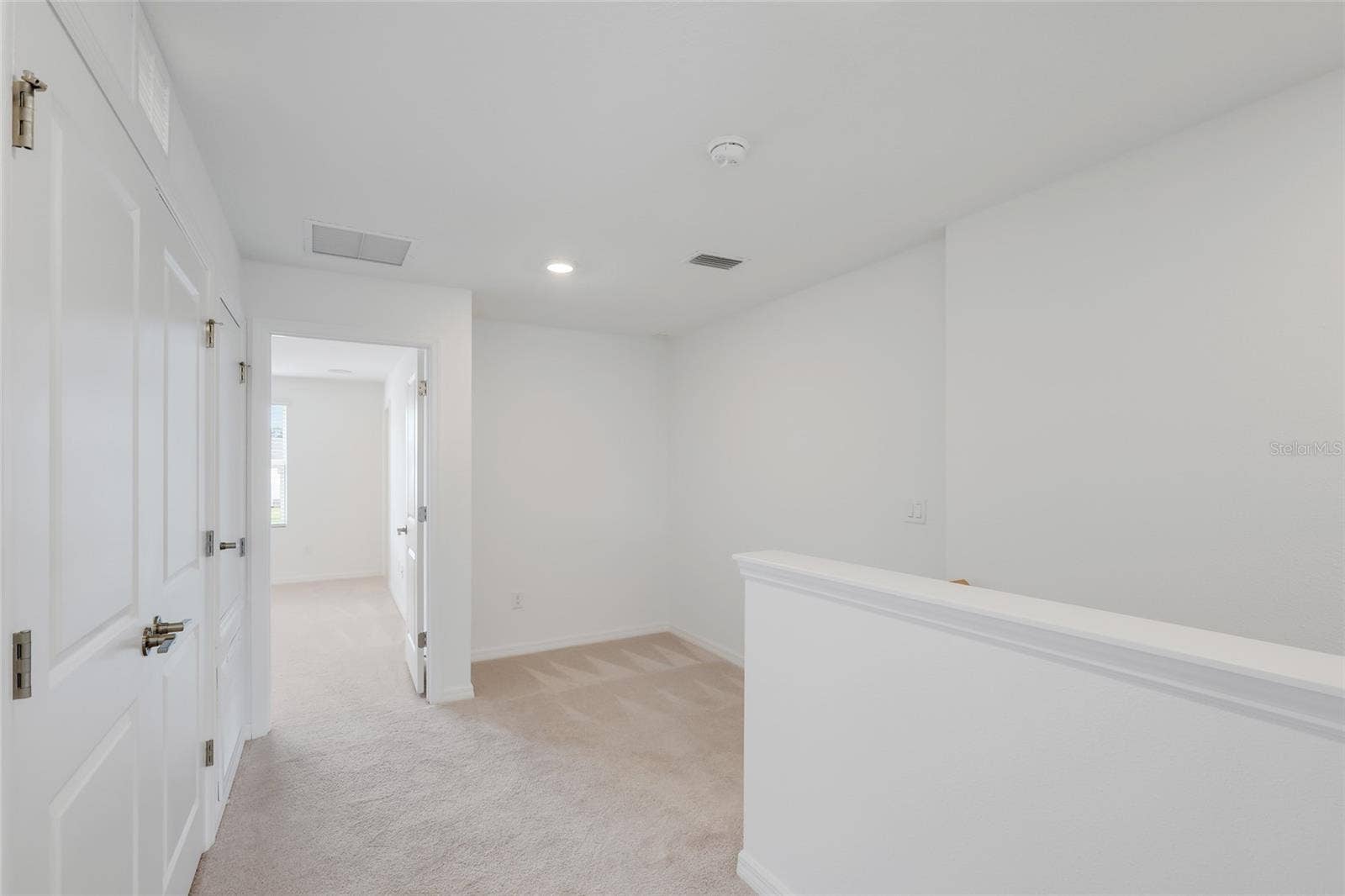 15150 GINETTI STREET, Nokomis, FL 34275 The loft area is perfect for a desk/office arrangement in the far corner! The laundry area is just off to the side providing easy use for all family members!