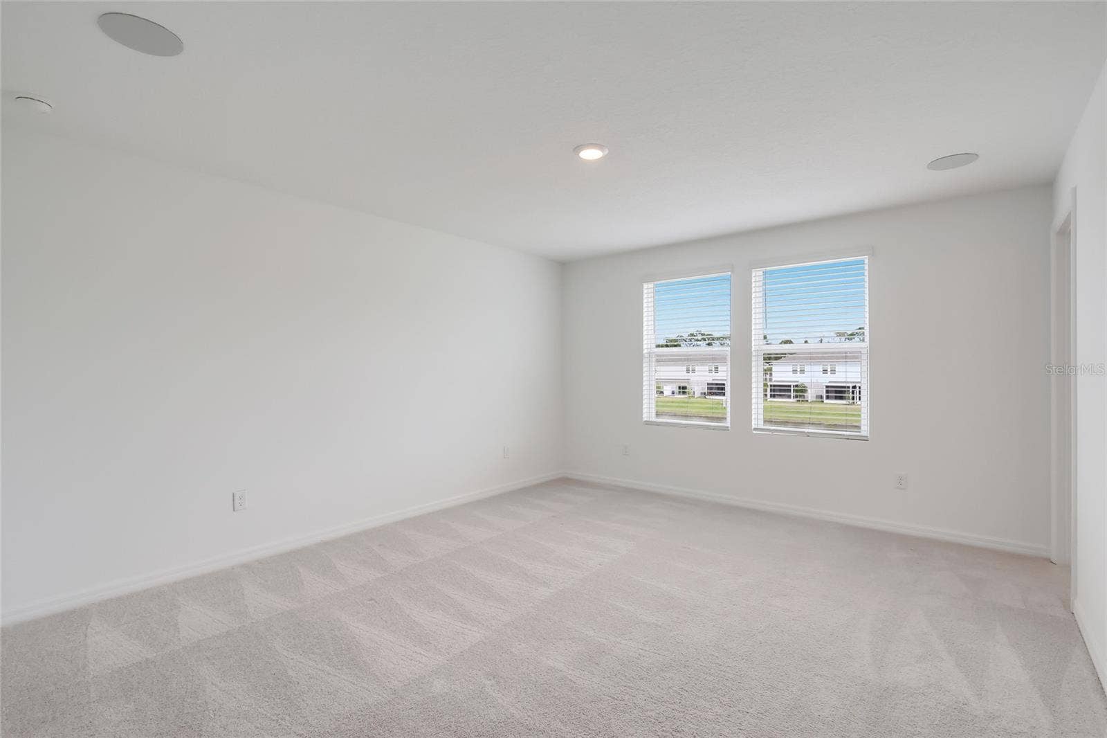 15150 GINETTI STREET, Nokomis, FL 34275 The second-floor master bedroom (nearly 3 feet longer than interior units) has incredible views of the lake and provides ample room for any furniture arrangement!