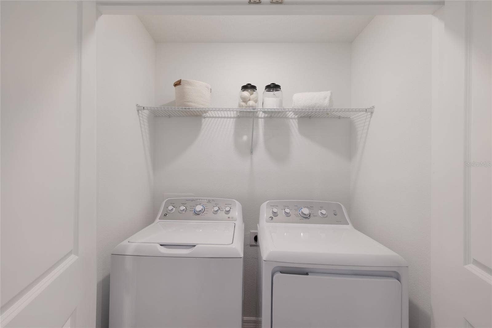 15150 GINETTI STREET, Nokomis, FL 34275 The laundry area/closet is located in the loft (on the second floor) for ease of use by all family members!