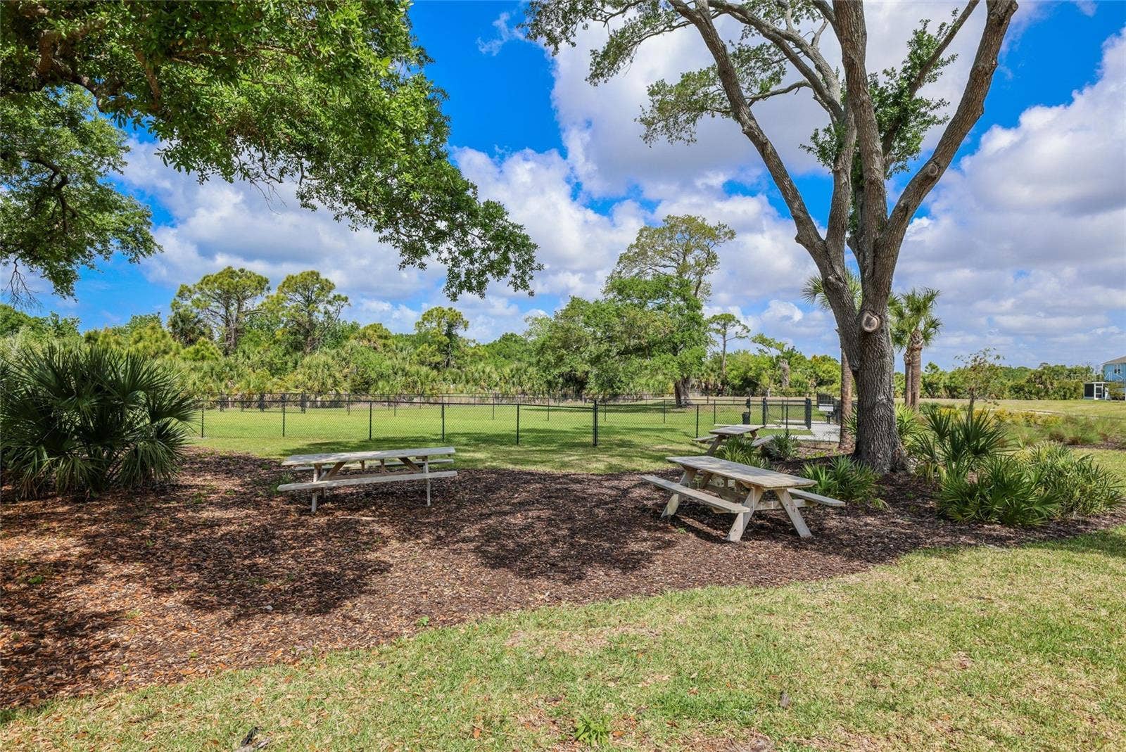 15150 GINETTI STREET, Nokomis, FL 34275 A picnic area is located just outside of the dog park to enjoy a nice outdoor family barbeque!
