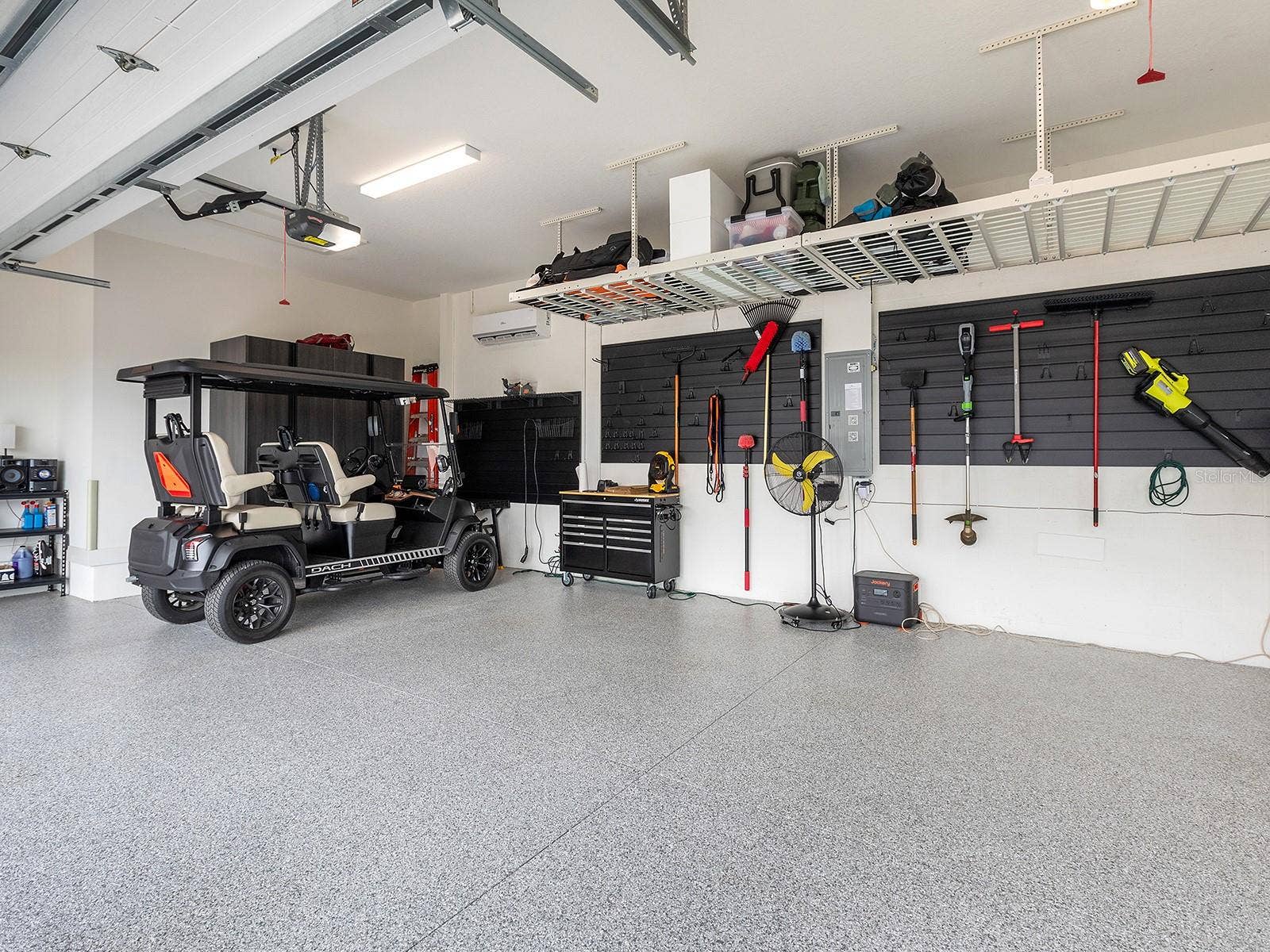 1320 IVORY TUSK CIRCLE, Sarasota, FL 34240 Garage with AC mini-split and storage