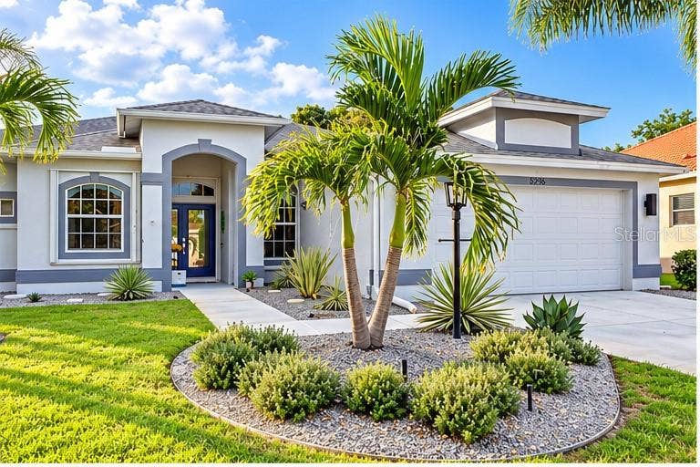 5296 CREEKSIDE TRAIL, Sarasota, FL 34243 New landscaping and outside painting in 2025