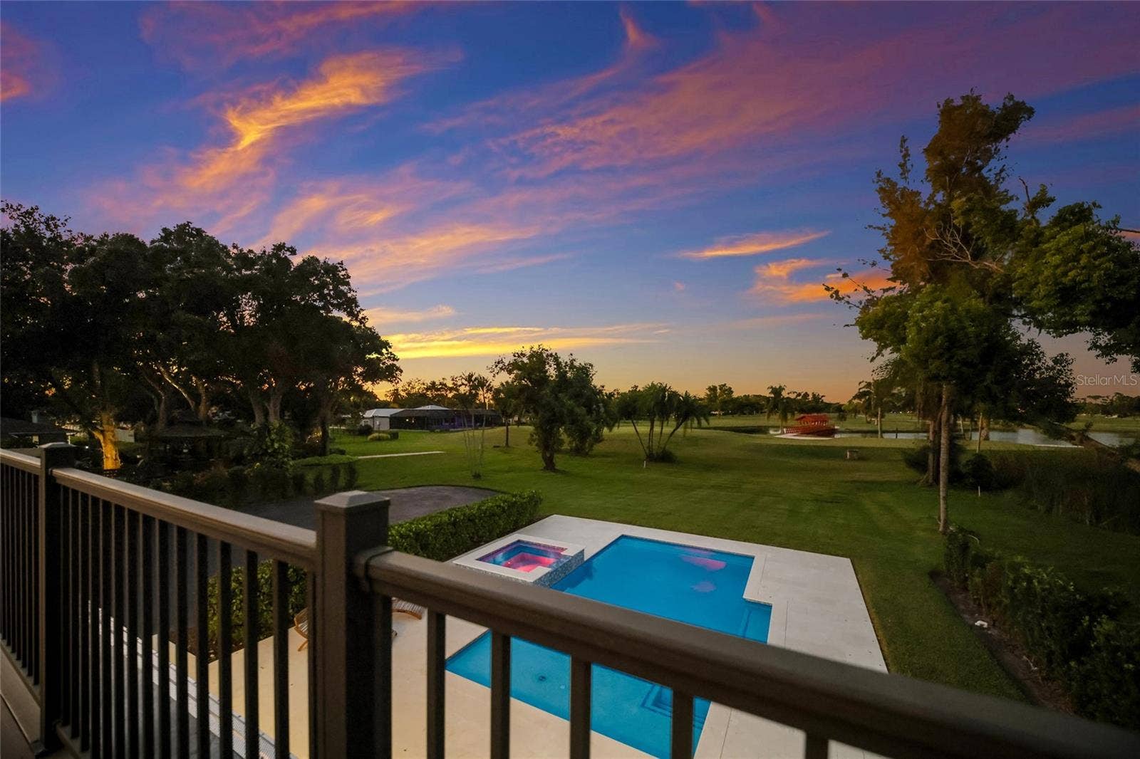 5060 18TH AVENUE W, Bradenton, FL 34209 Overlooking the pool and golf course.
