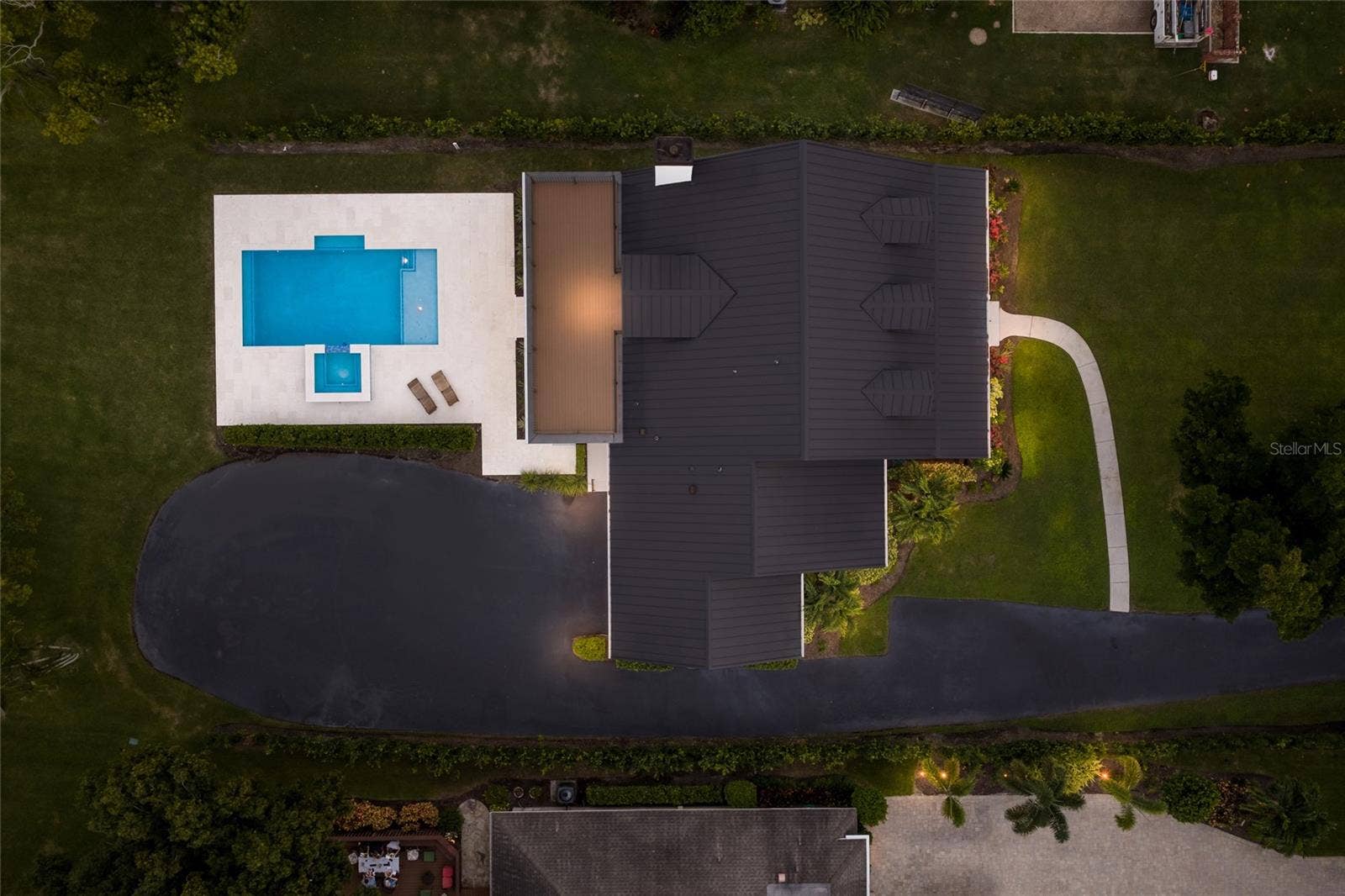 5060 18TH AVENUE W, Bradenton, FL 34209 Aerial view of home and pool.