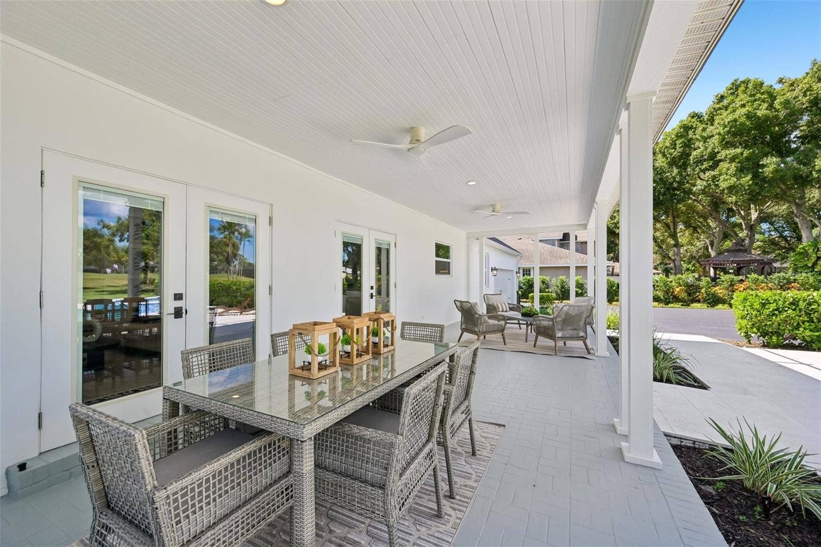 5060 18TH AVENUE W, Bradenton, FL 34209 Expansive back porch offers plenty of room to entertain.
