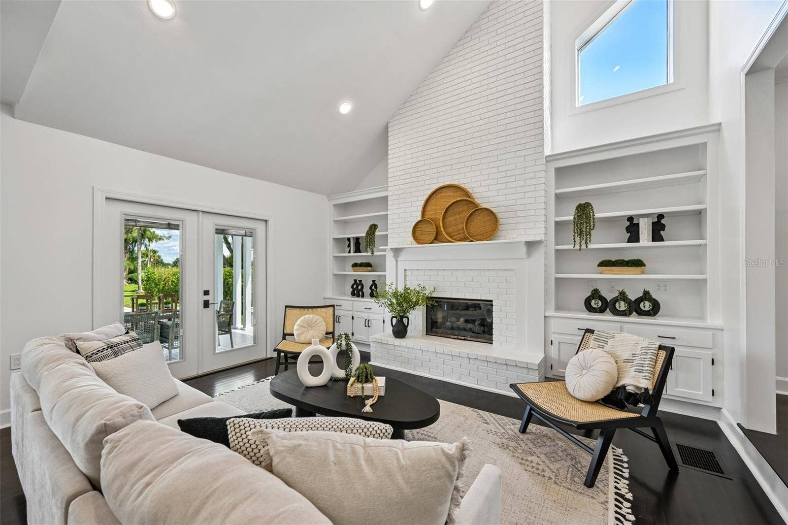 5060 18TH AVENUE W, Bradenton, FL 34209 Light and bright with access to the back porch and private pool.