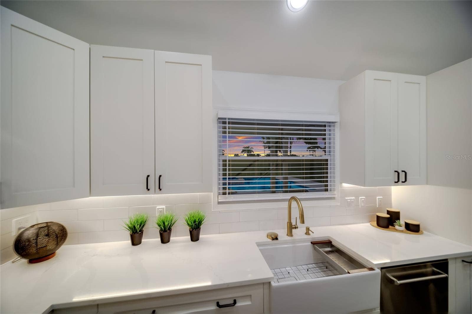 5060 18TH AVENUE W, Bradenton, FL 34209 Deep farmhouse sink beneath the window.