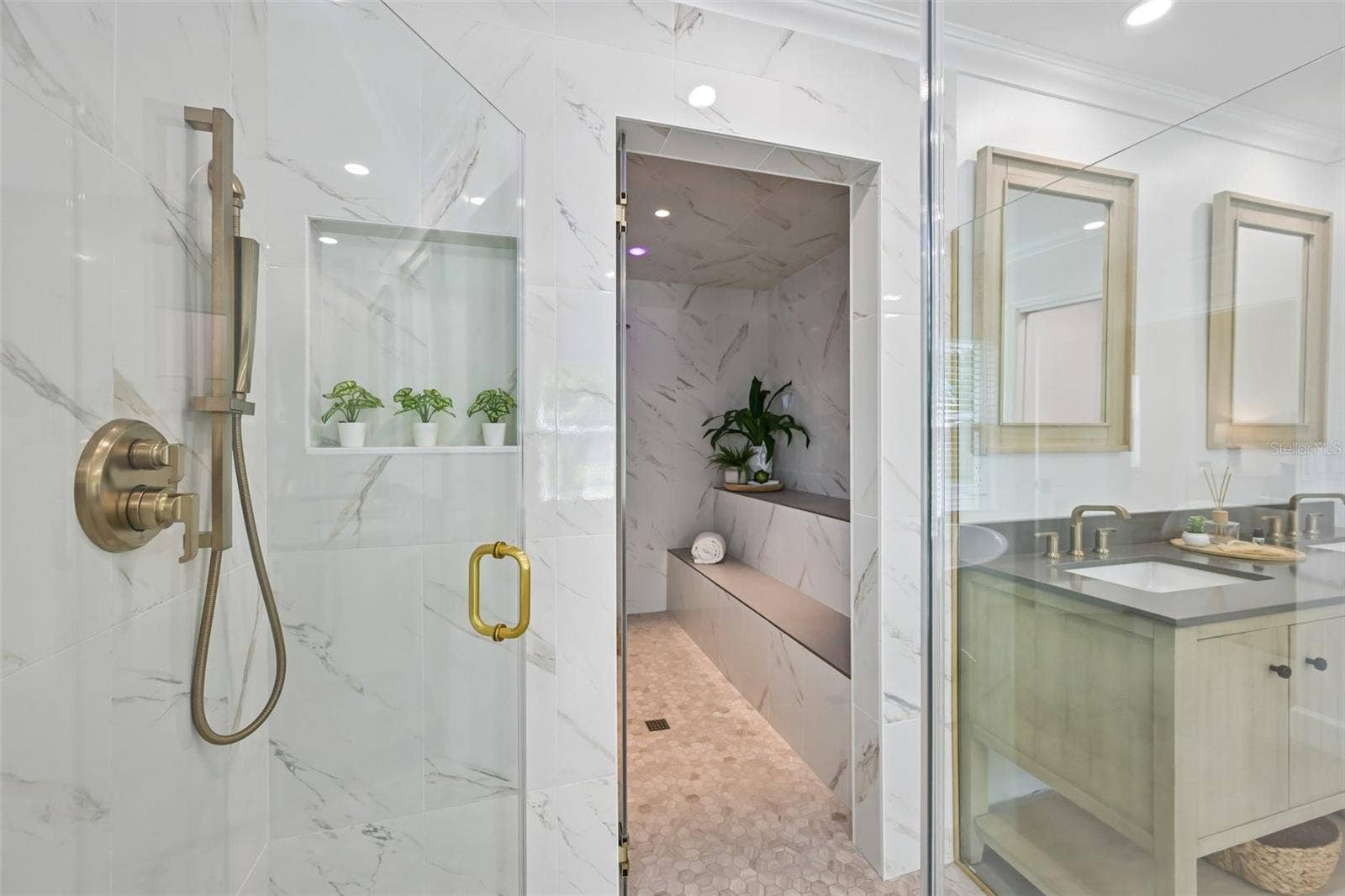 5060 18TH AVENUE W, Bradenton, FL 34209 Beautiful large walk-in shower that lead to a...