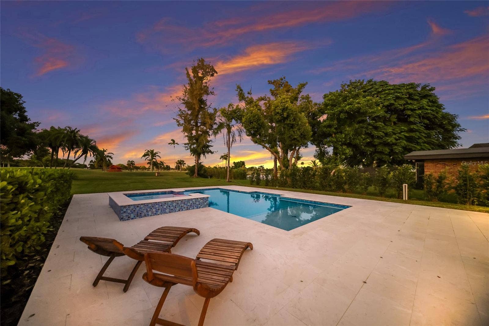 5060 18TH AVENUE W, Bradenton, FL 34209 Plenty of deck space around the pool and spa