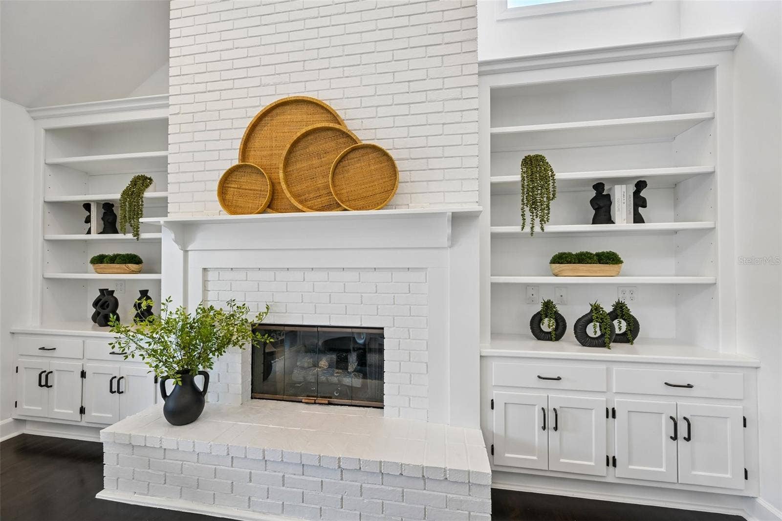 5060 18TH AVENUE W, Bradenton, FL 34209 Beautiful white brick fire place with custom built-ins