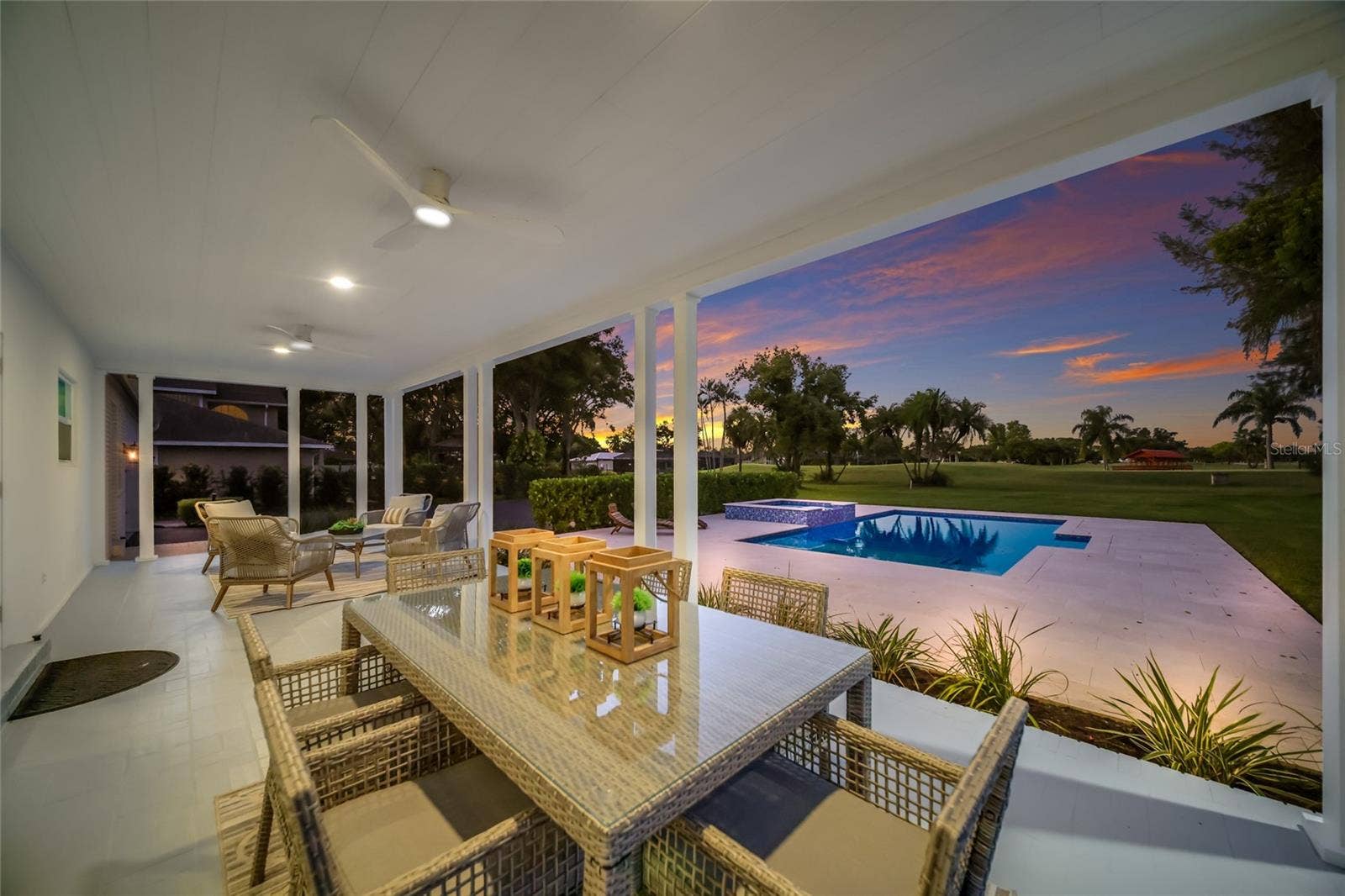 5060 18TH AVENUE W, Bradenton, FL 34209 Back porch overlooks the pool and golf course.