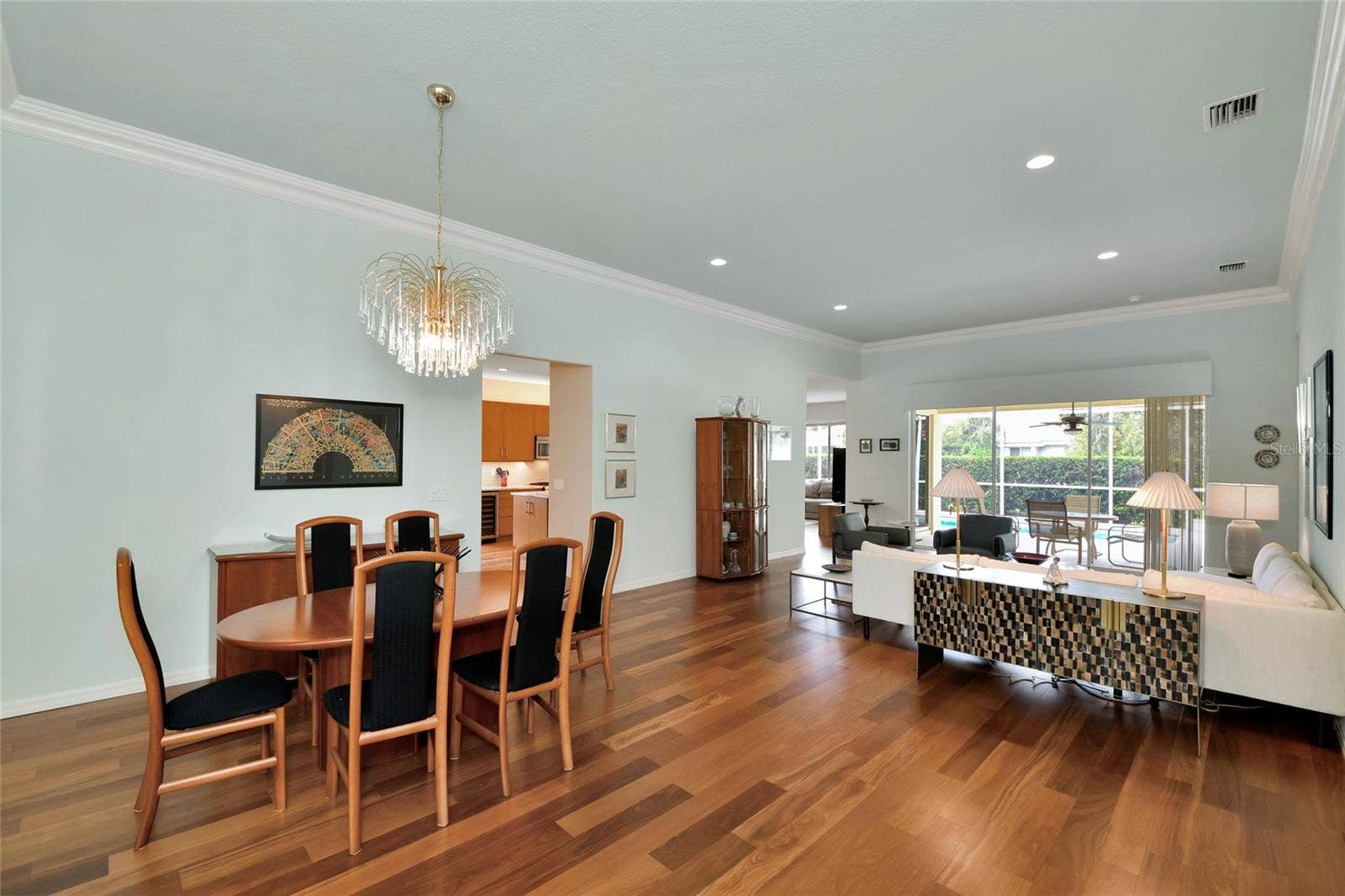6256 DONNINGTON COURT, Sarasota, FL 34238 Brazilian wide plank teak floors in all active living areas.