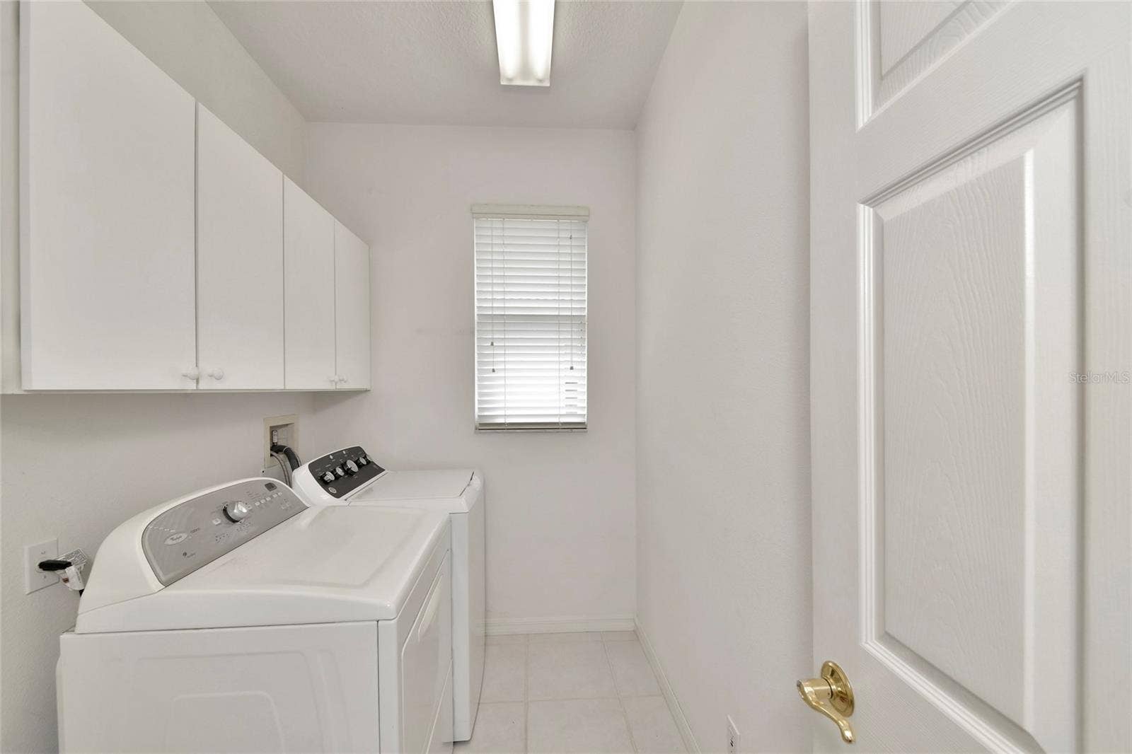 6256 DONNINGTON COURT, Sarasota, FL 34238 Inside laundry, natural gas dryer, not shown utility sink.