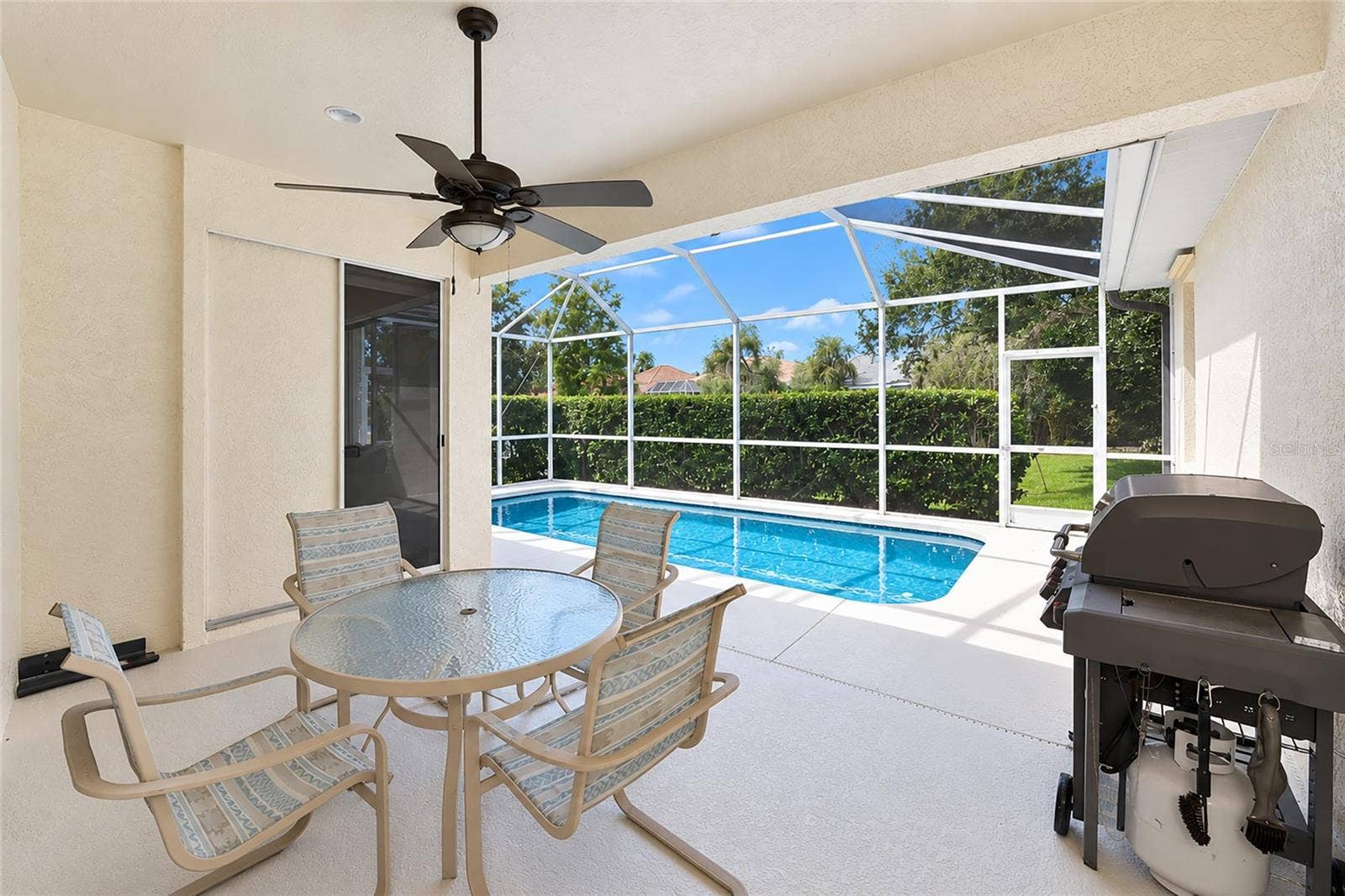 6256 DONNINGTON COURT, Sarasota, FL 34238 Covered lanai 17.5'x10.75' off family room and living room sliding doors